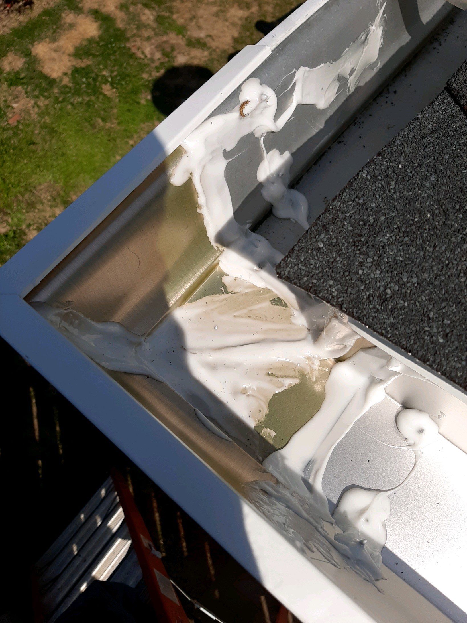 Gutter Installation Using White K-Style 6 Inch Seamless Gutters by Gutter Professors