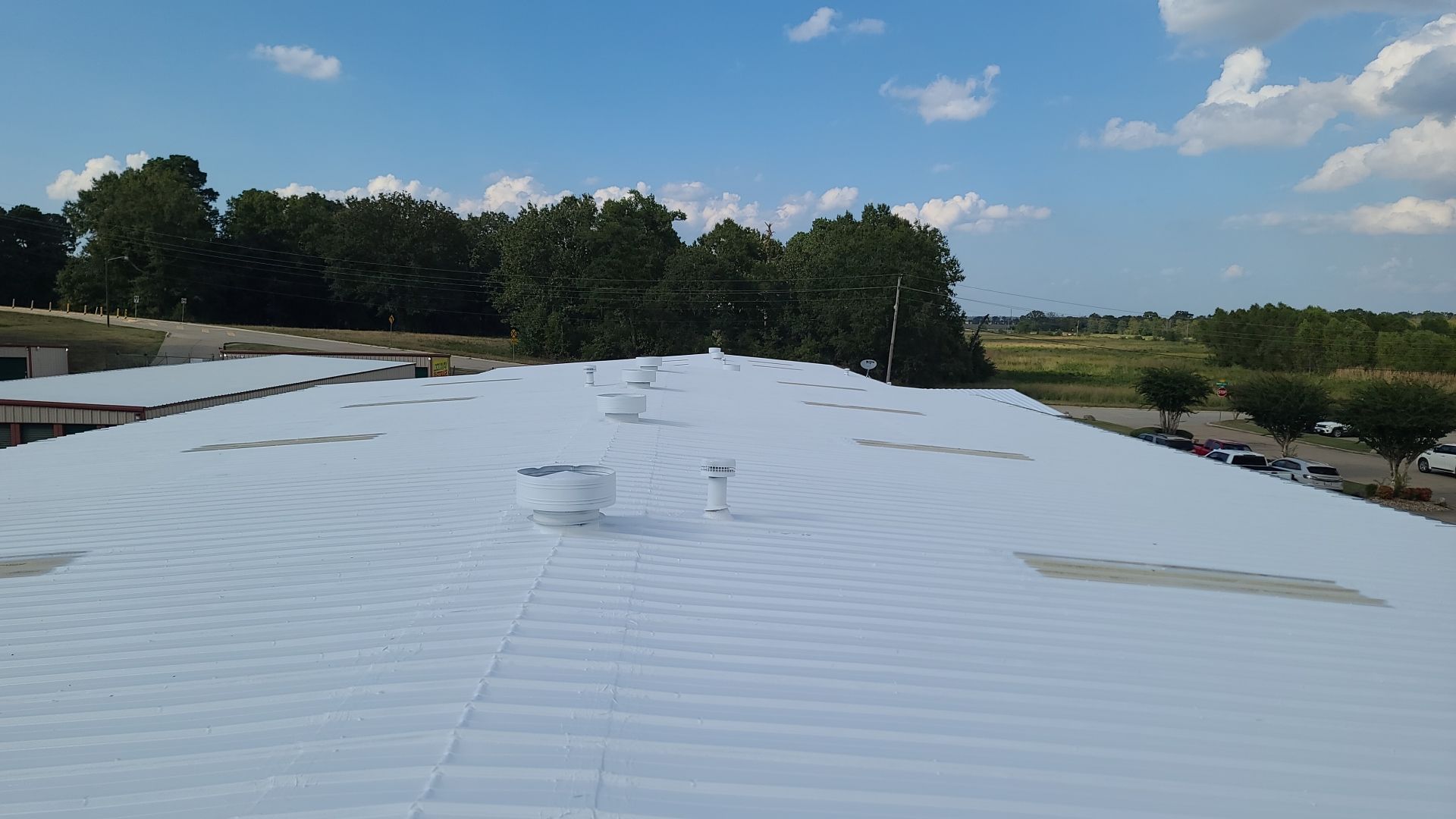 Commercial Metal Restoration System using Aldocoat Coatings by Hostetler Roofing