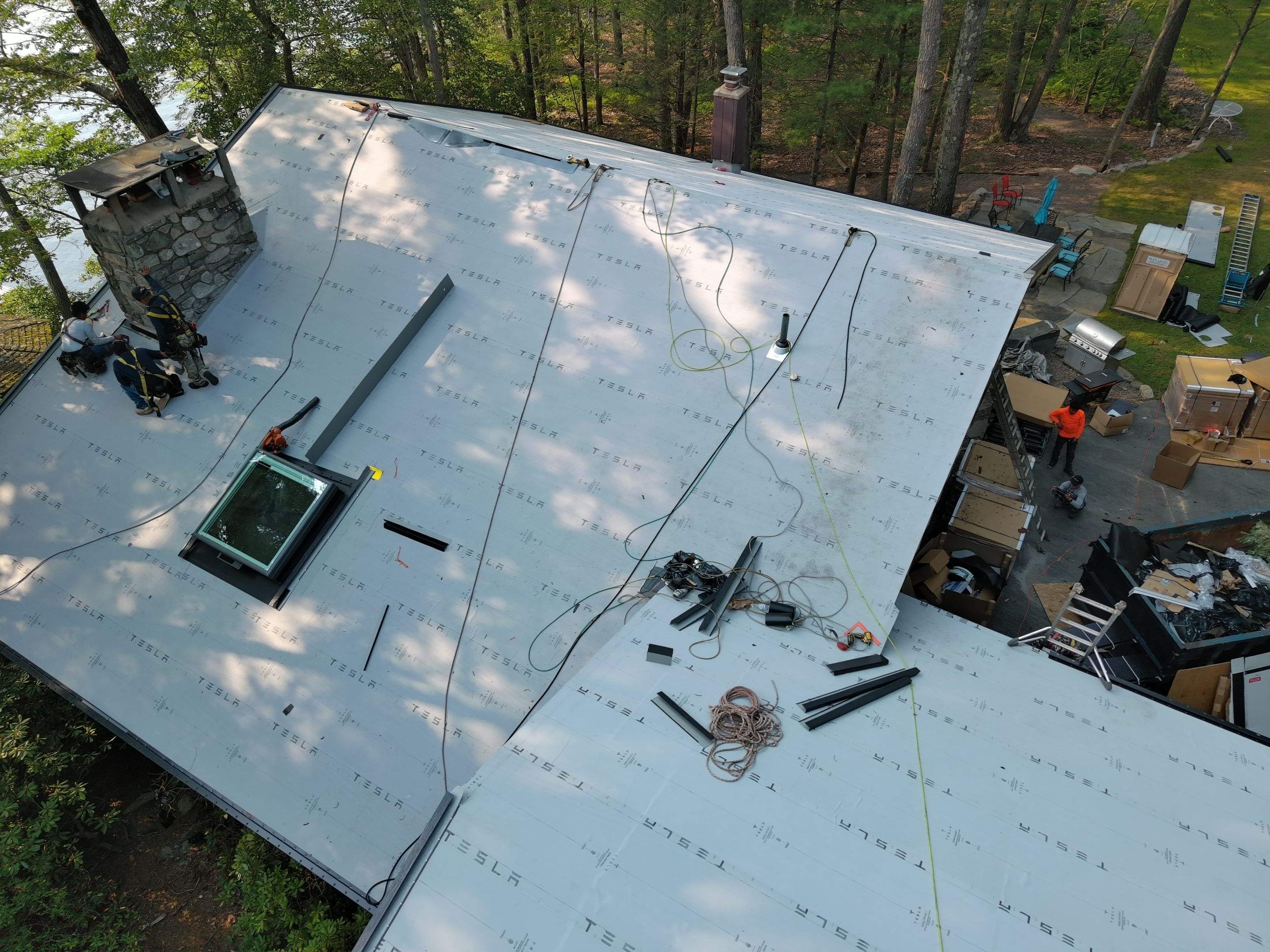 Stunning Tesla Solar Roof Cabin in the Woods by American Home Contractors