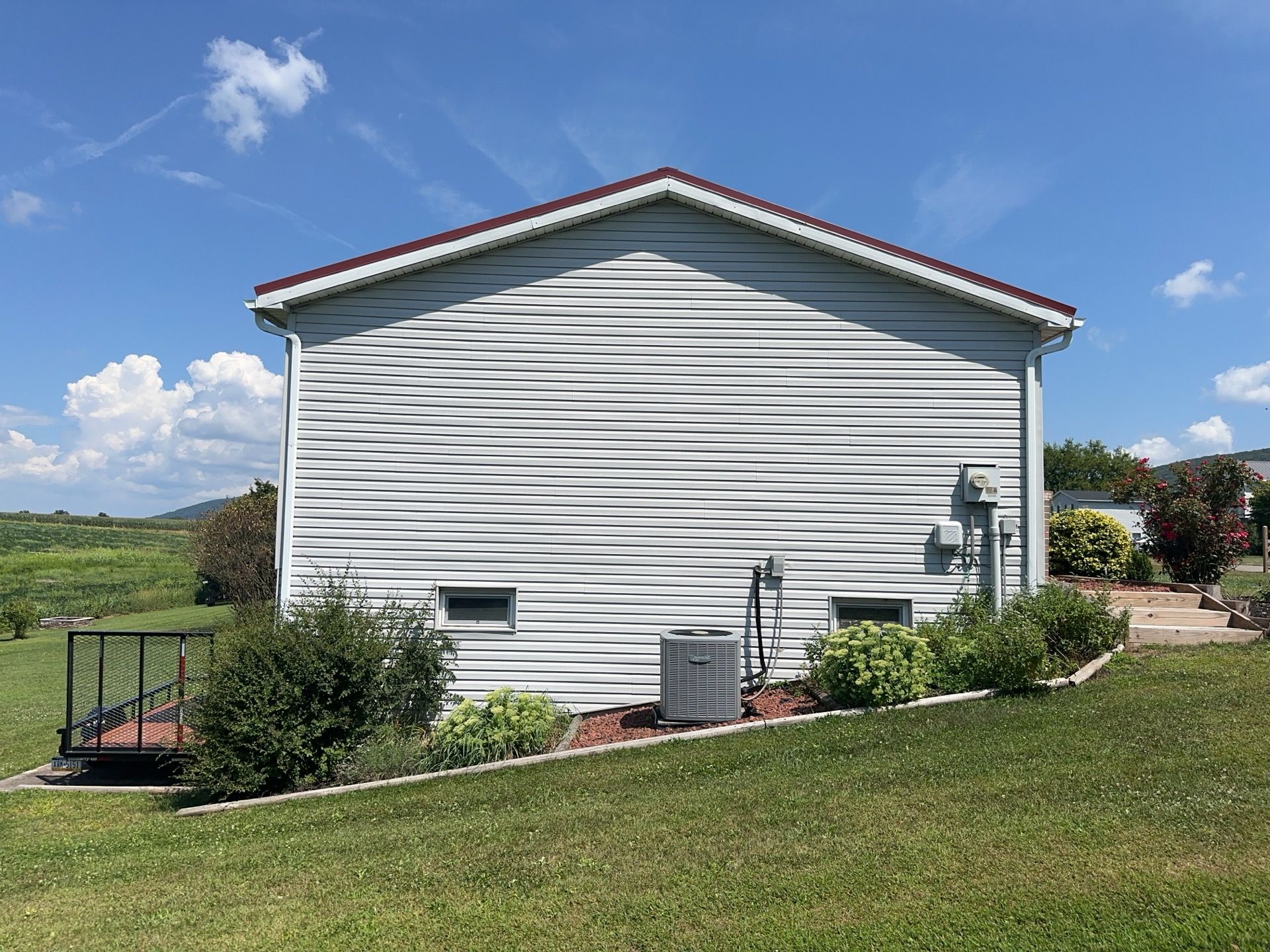 Vinyl Siding Replacement and Patio Door Installation in Elizabethville by Esh Builders