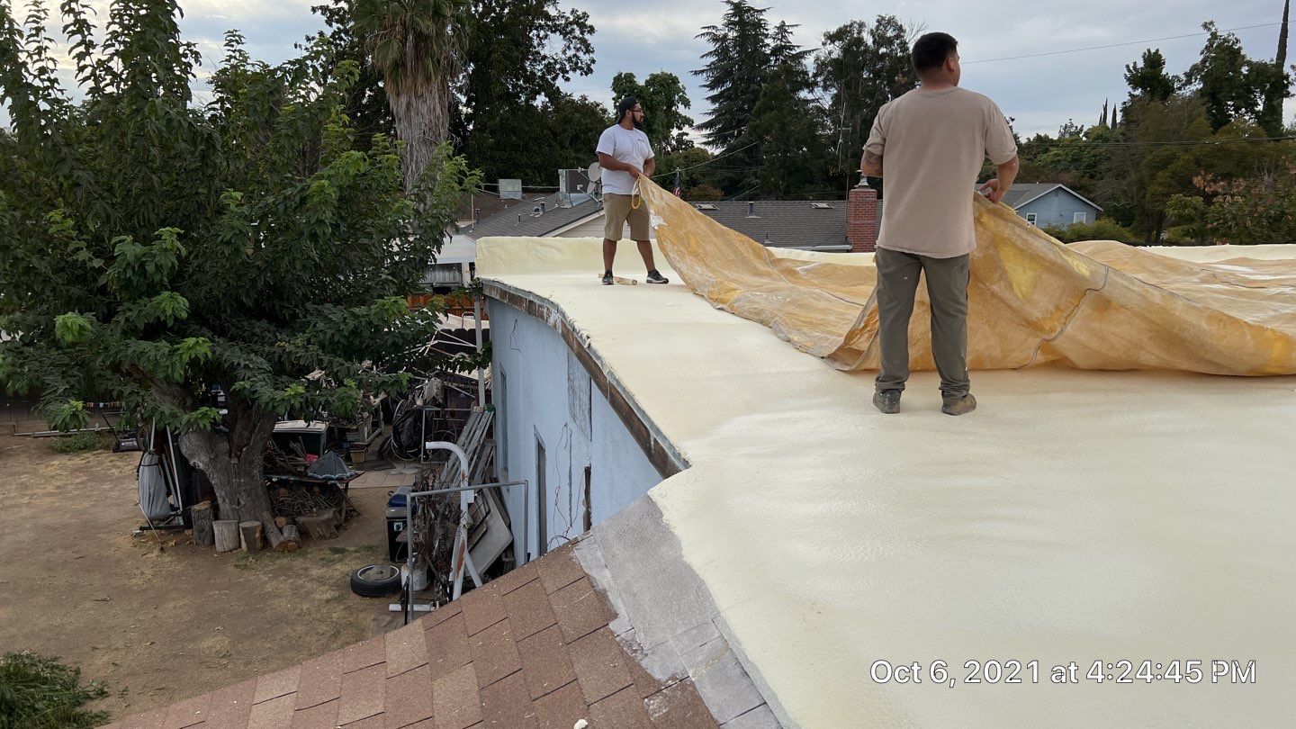 Residential Roofing Installation using Spray foam roofing insulation and General Coatings acrylic coatings by Straight Edge Roofing Inc