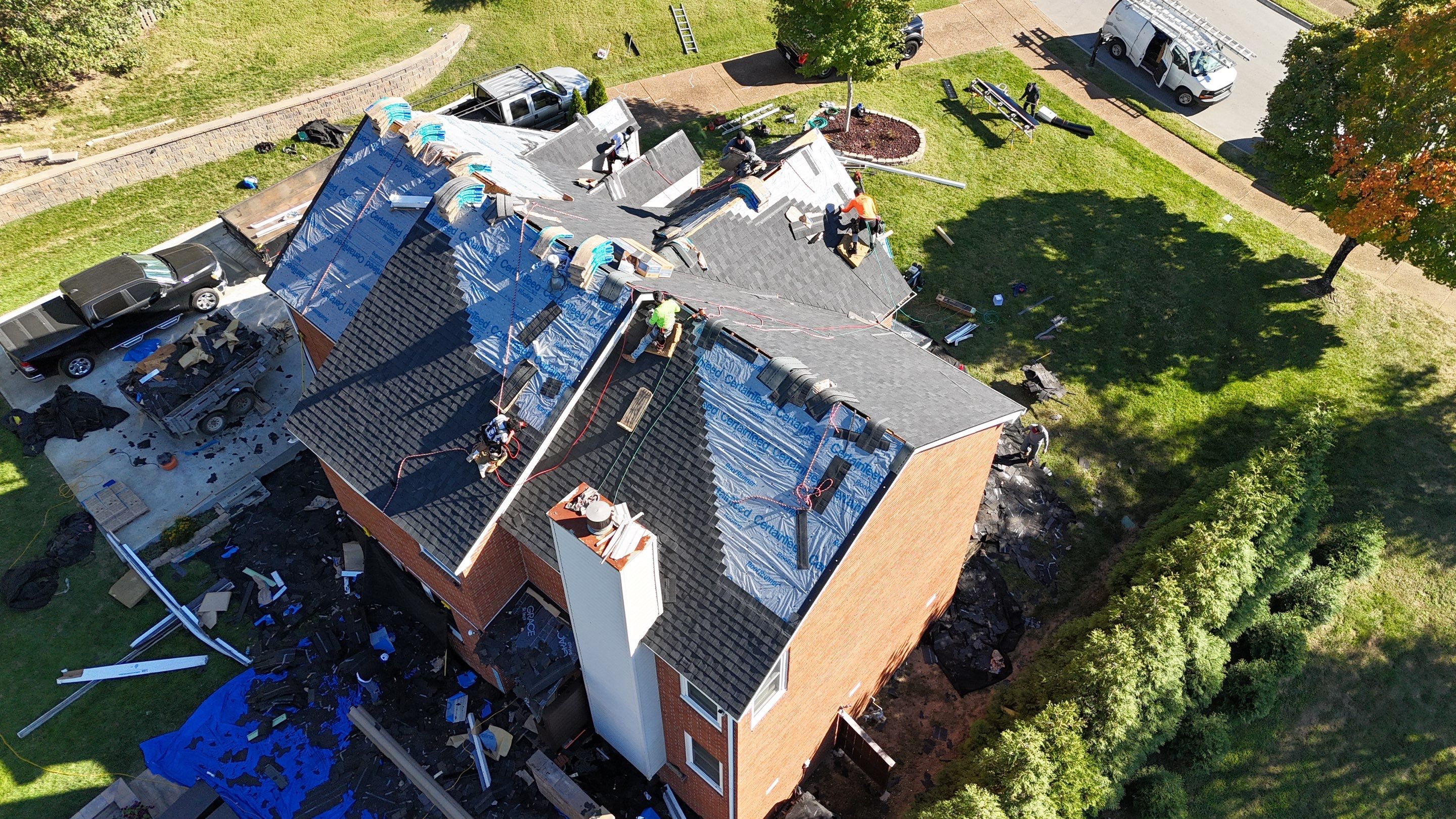 Charcoal Black Re-Roof & Gutters by Royal House LLC