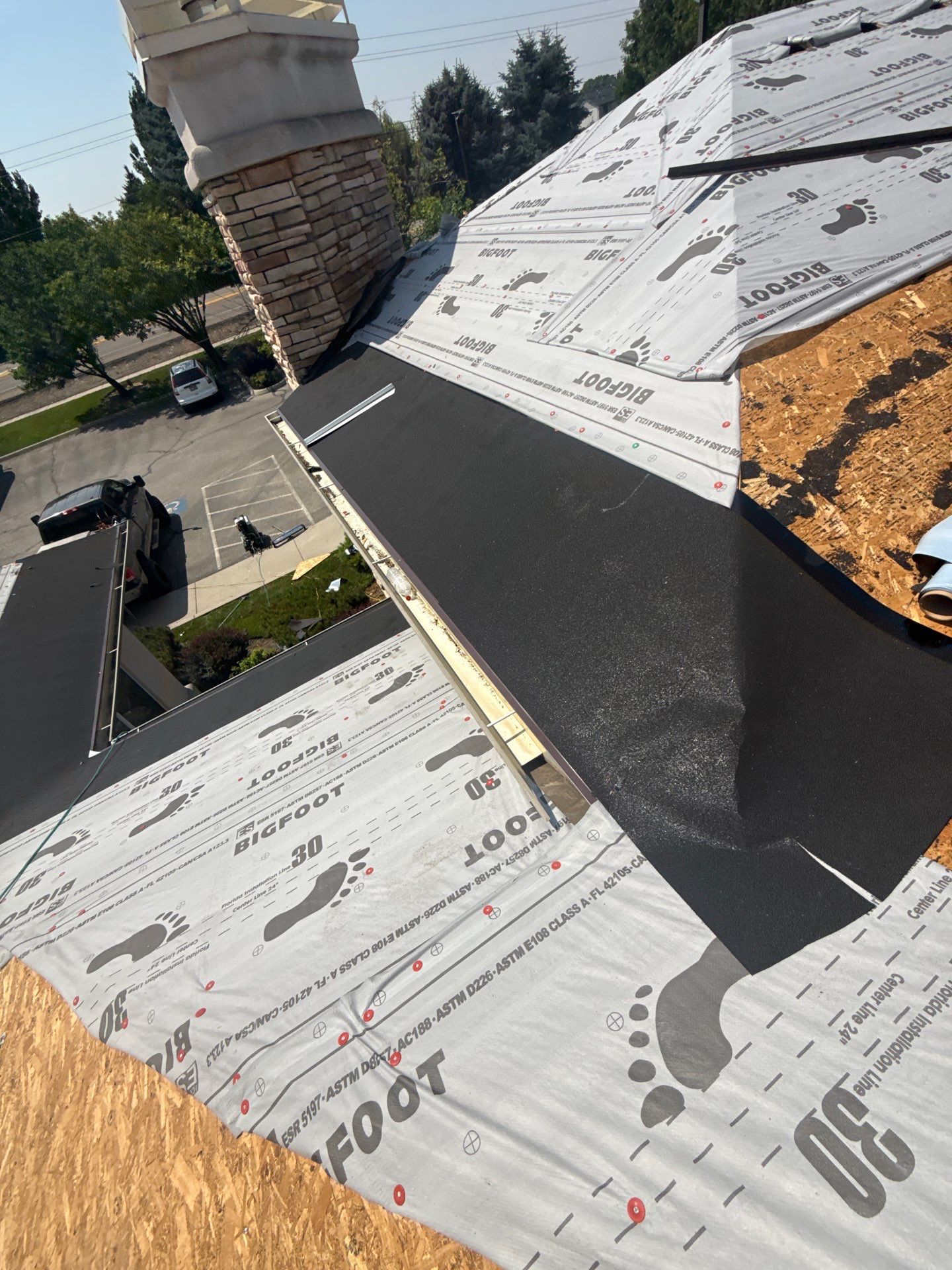 Boise Commercial Roof Replacement with Brown Architectural Shingles by Olive Roofing
