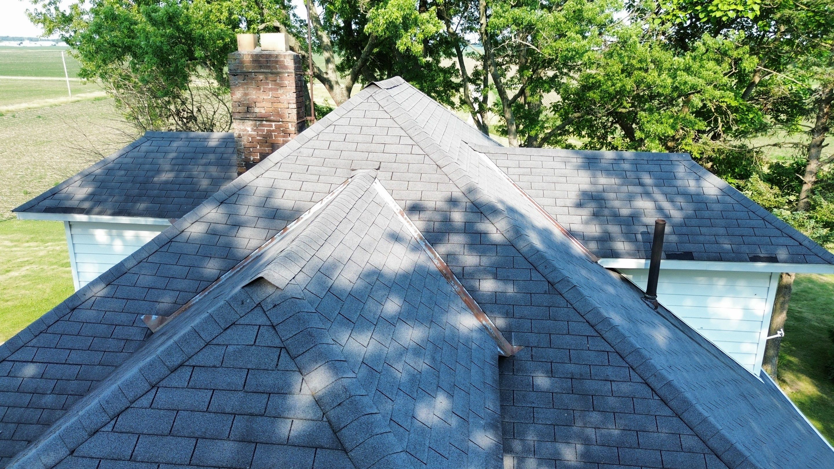 Residential Roofing Installation using Performance Panel Metal - Copper Metallic by RoofX 