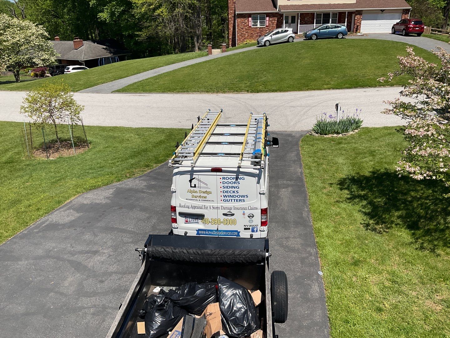Residential Roofing Installation using Landmark Shingles Color Weatherwood by Alpha Design Services