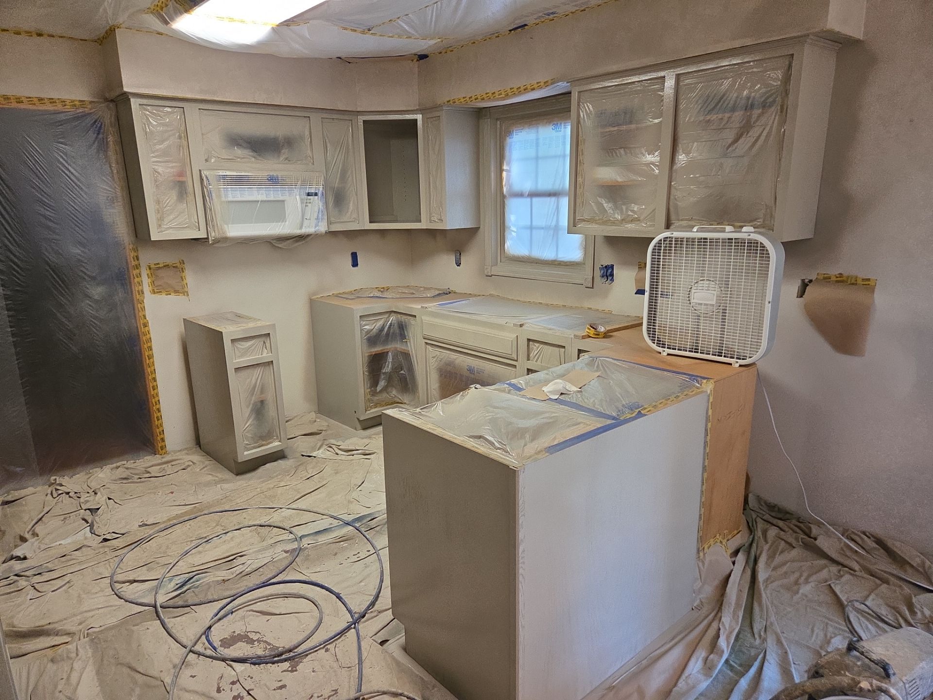 Kitchen Cabinet Painting and Hardware Update in Sioux Falls by Select Painting, Coatings & Garage Cabinets