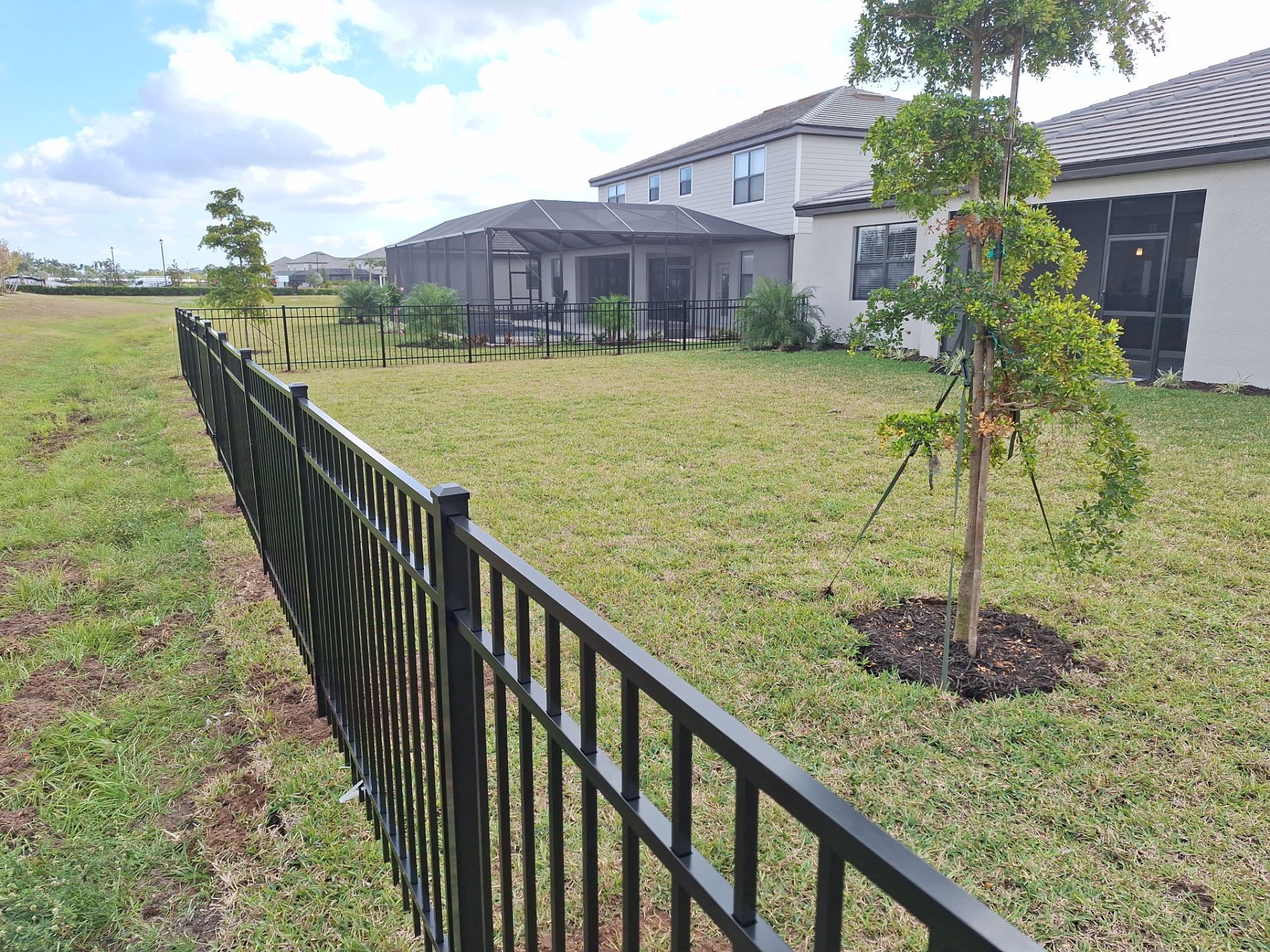 Aluminum Fence Installation using 4ft 3 Rail Black Aluminum Fence by Asap fence and gates, LLC