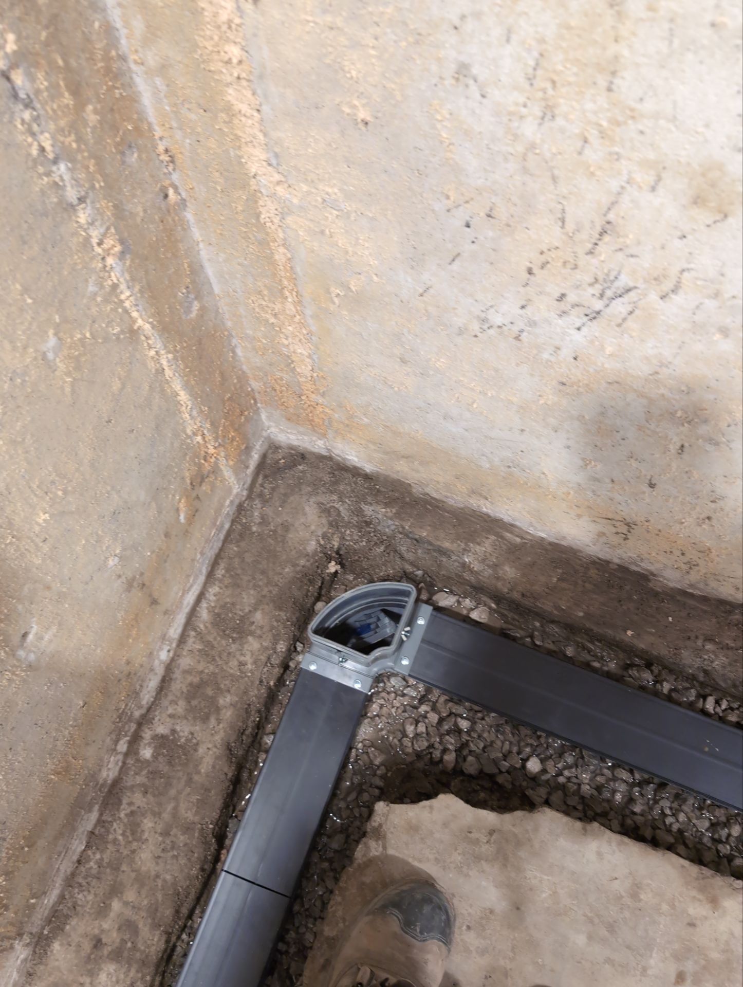Interior Basement Waterproofing System and Egress Window Installation by Toledo Basement Repair 