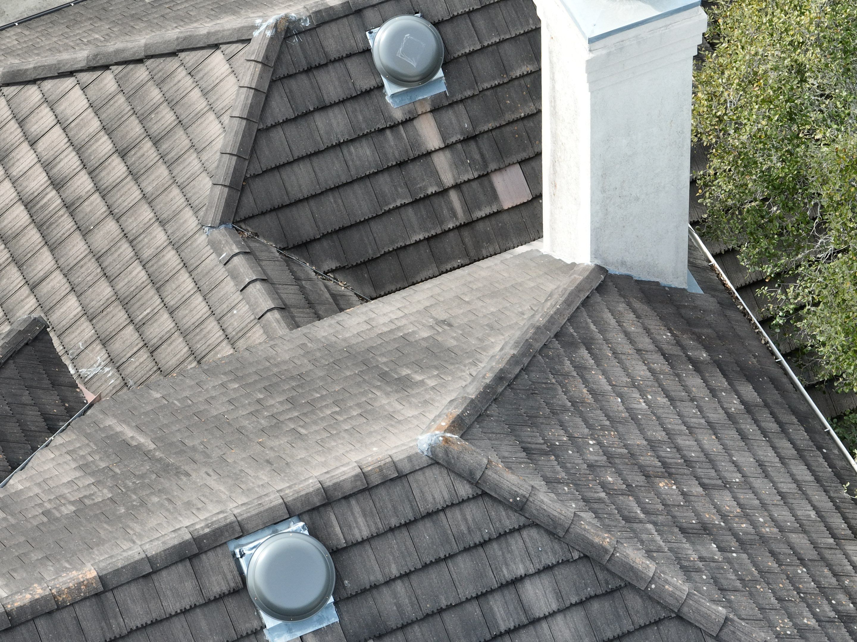 Tile Roof Repair  by Premier Roofing and Contracting