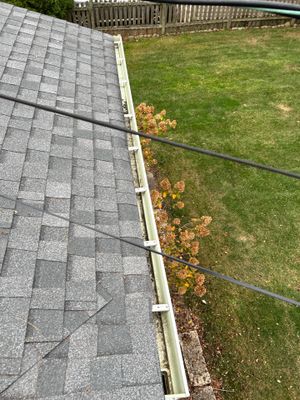 Turtle Shell gutter protection installation in Wheaton, IL 60189, photograph 17