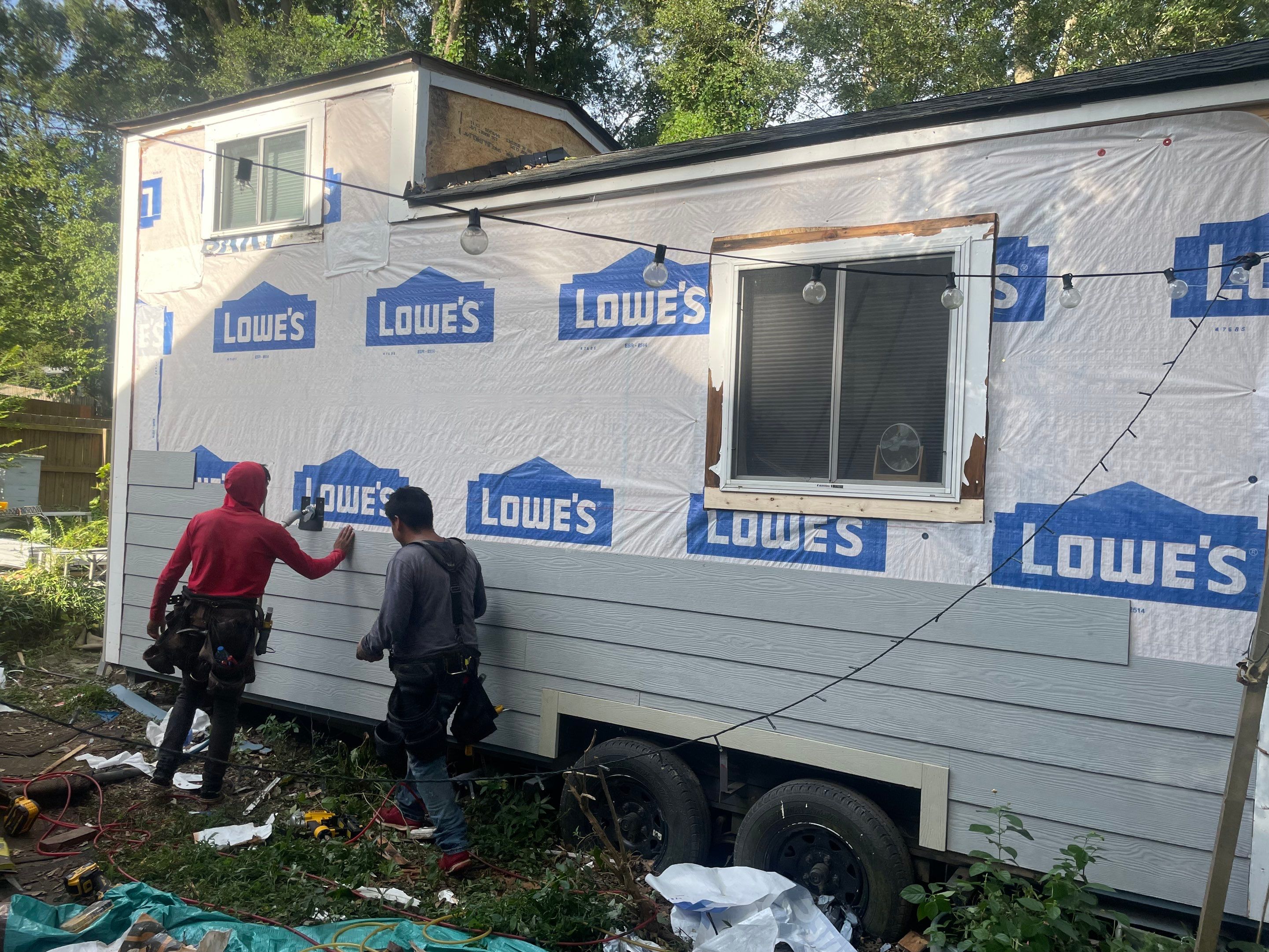 tiny home remodel- siding,paint,roofing by Nailed It Roofing & Remodeling LLC