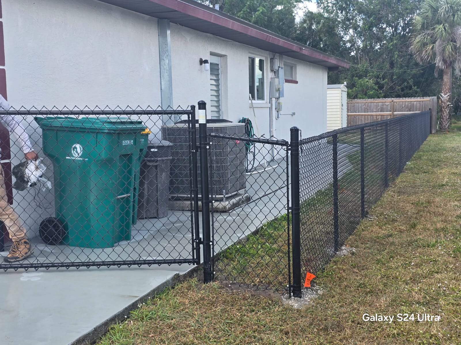 Black Chain Link Fence Installation for Port Charlotte Residence by True Fence LLC