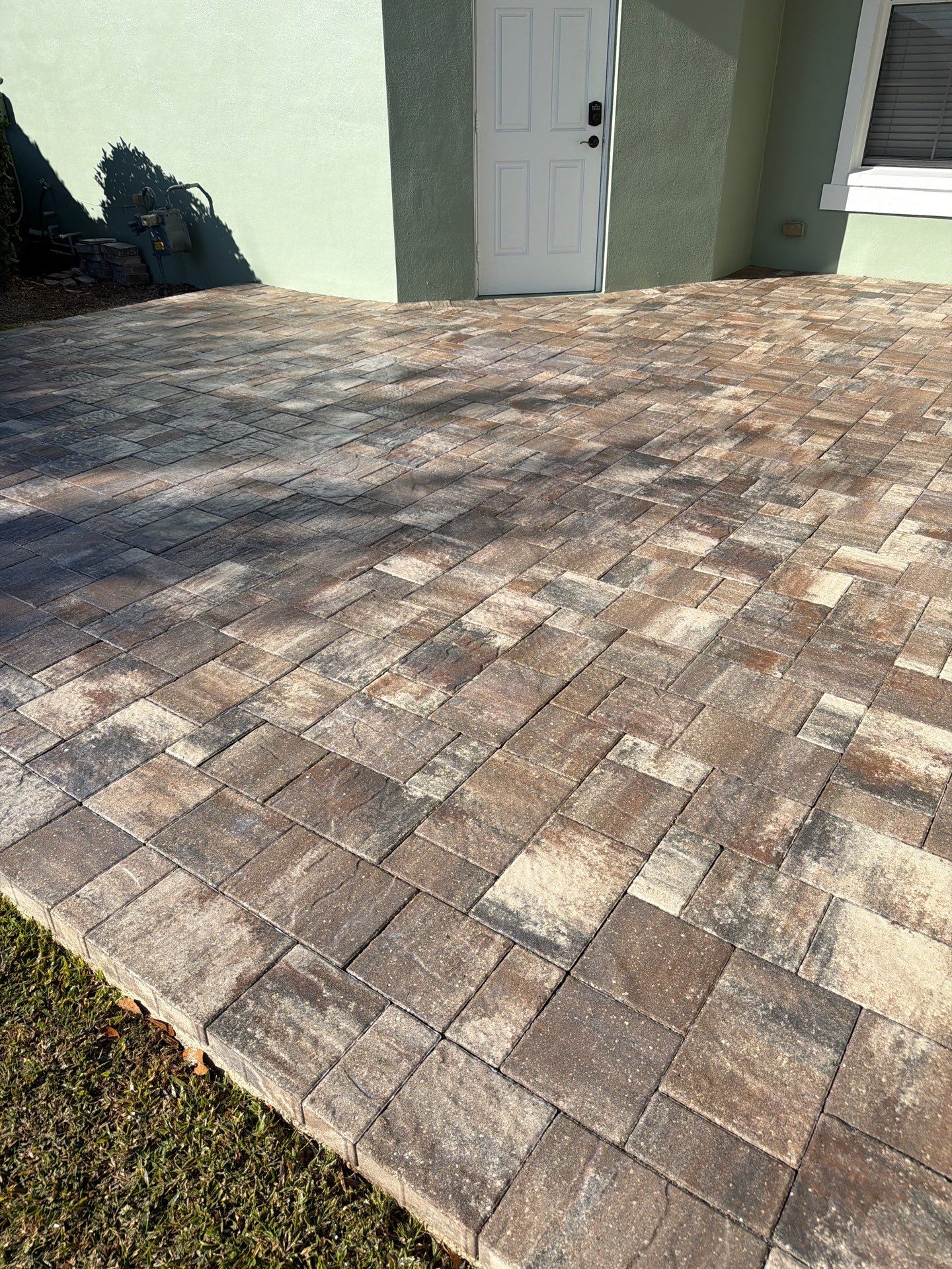 Multi-Toned Paver Patio and Walkway sealing in Mira Bay Apollo Beach by Supreme Paver Experts