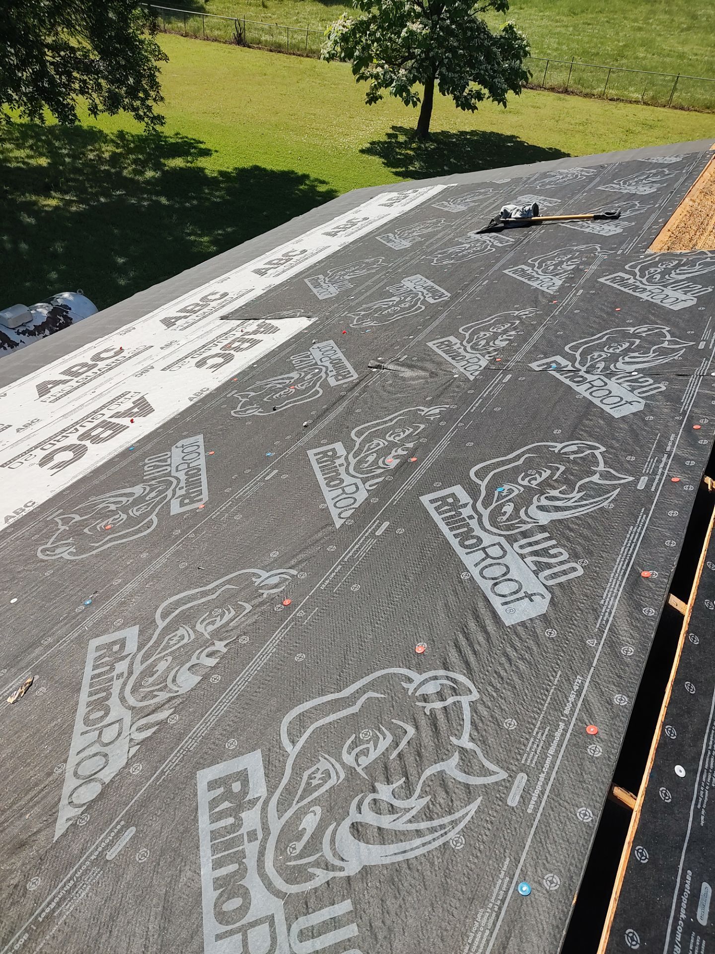 Roof replacement & Storm Door by In & Out Construction & Remodeling, LLC