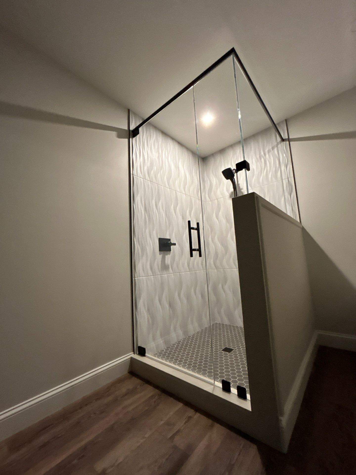Frameless Shower Enclosure w/Header Bar by Cheshire Glass Company