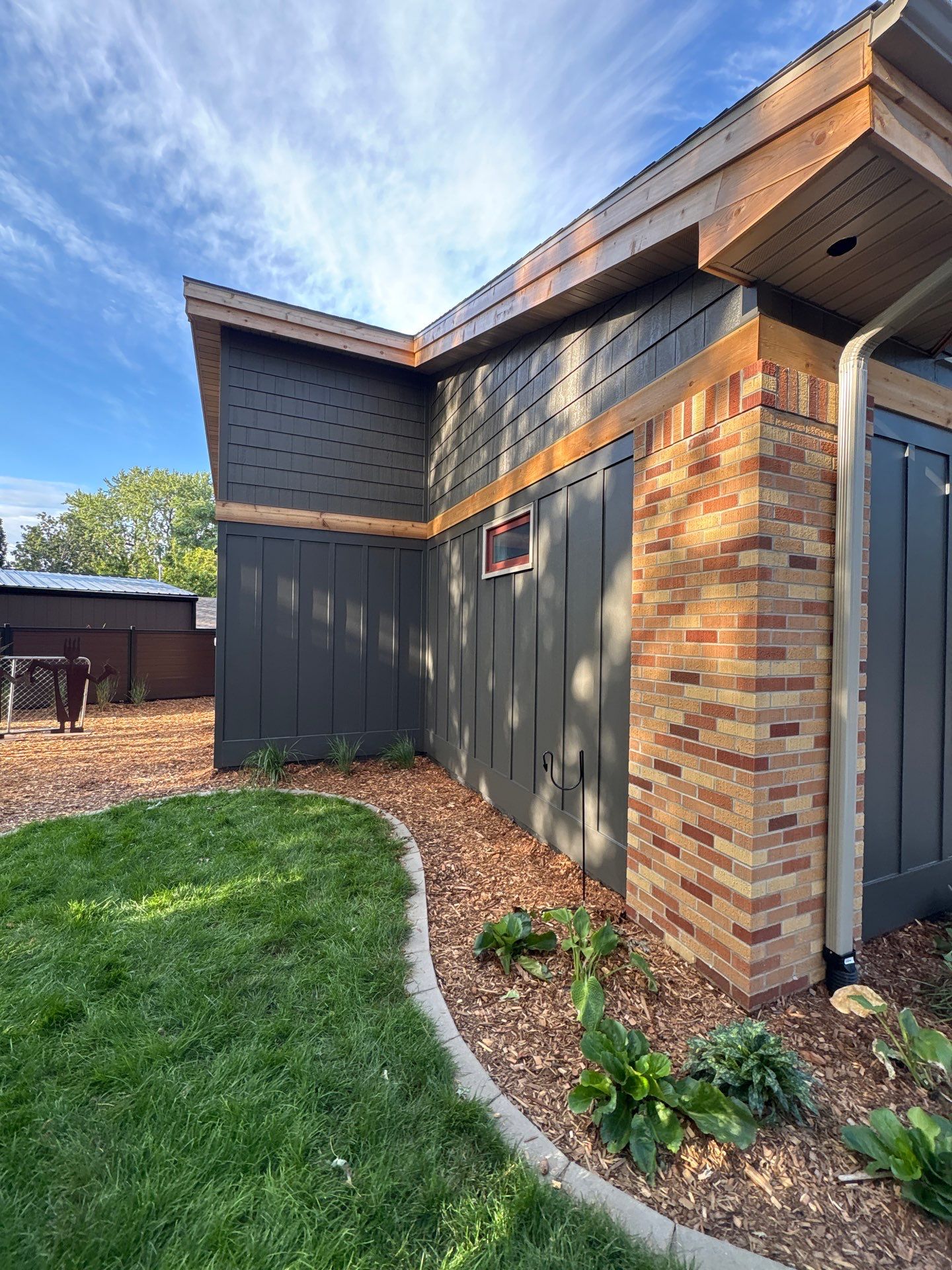 Exterior Siding and Brick Painting for Sioux Falls Garage by Select Painting, Coatings & Garage Cabinets