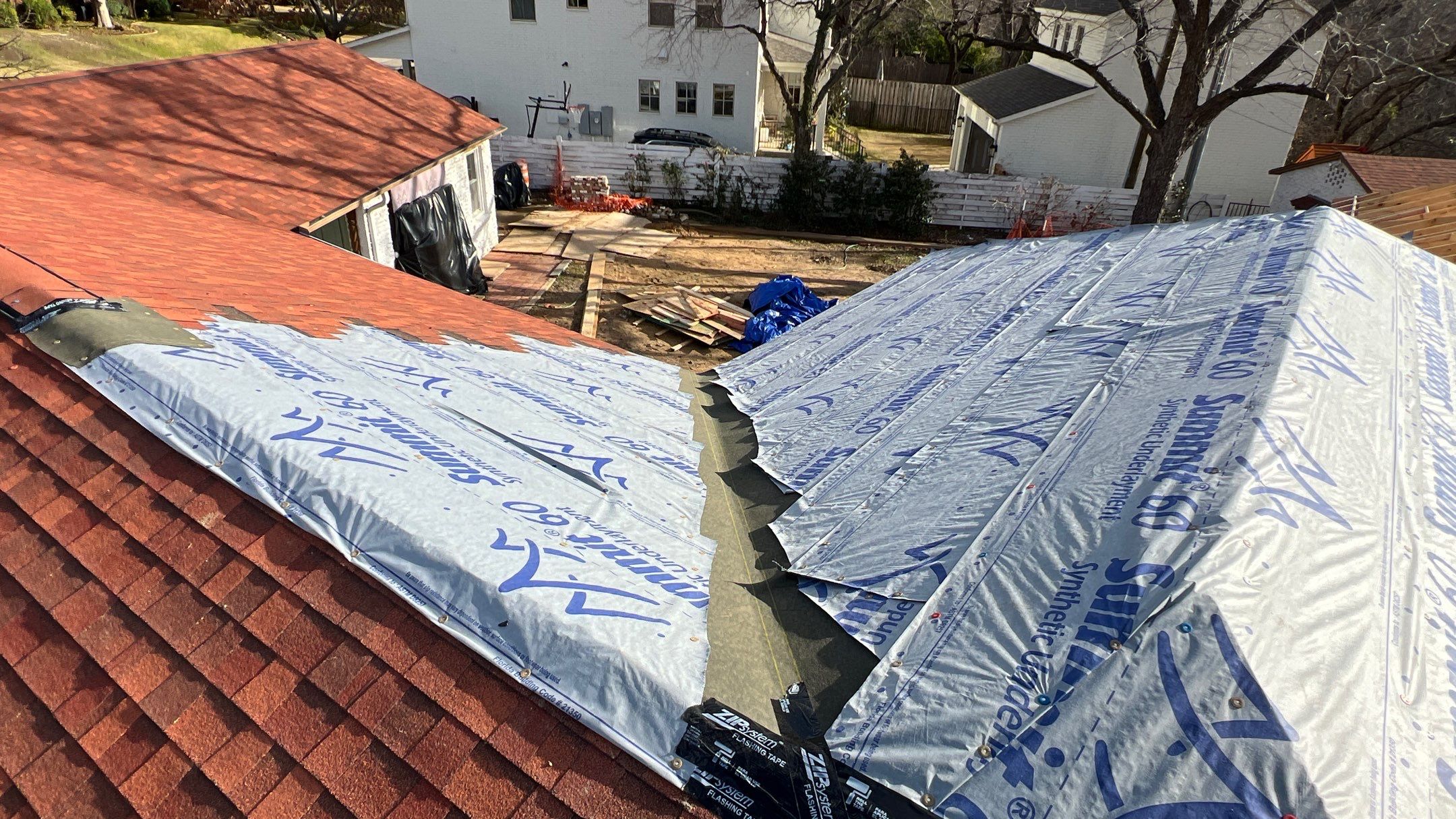 Residential Roofing Installation using Matching Roof Shingles by Harvey Roofing & Construction