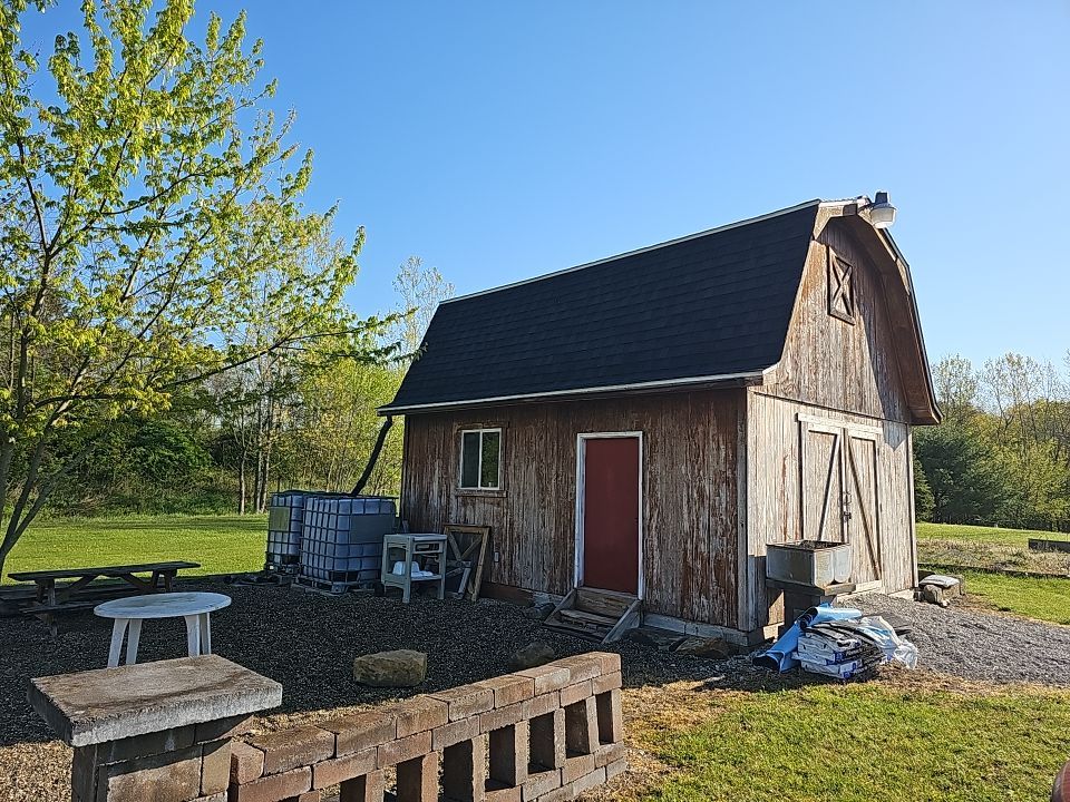 ATLAS PINNACLE COLOR: BLACK SHADOW DRIP EDGE: WHITE by Eagle Eye Roofing