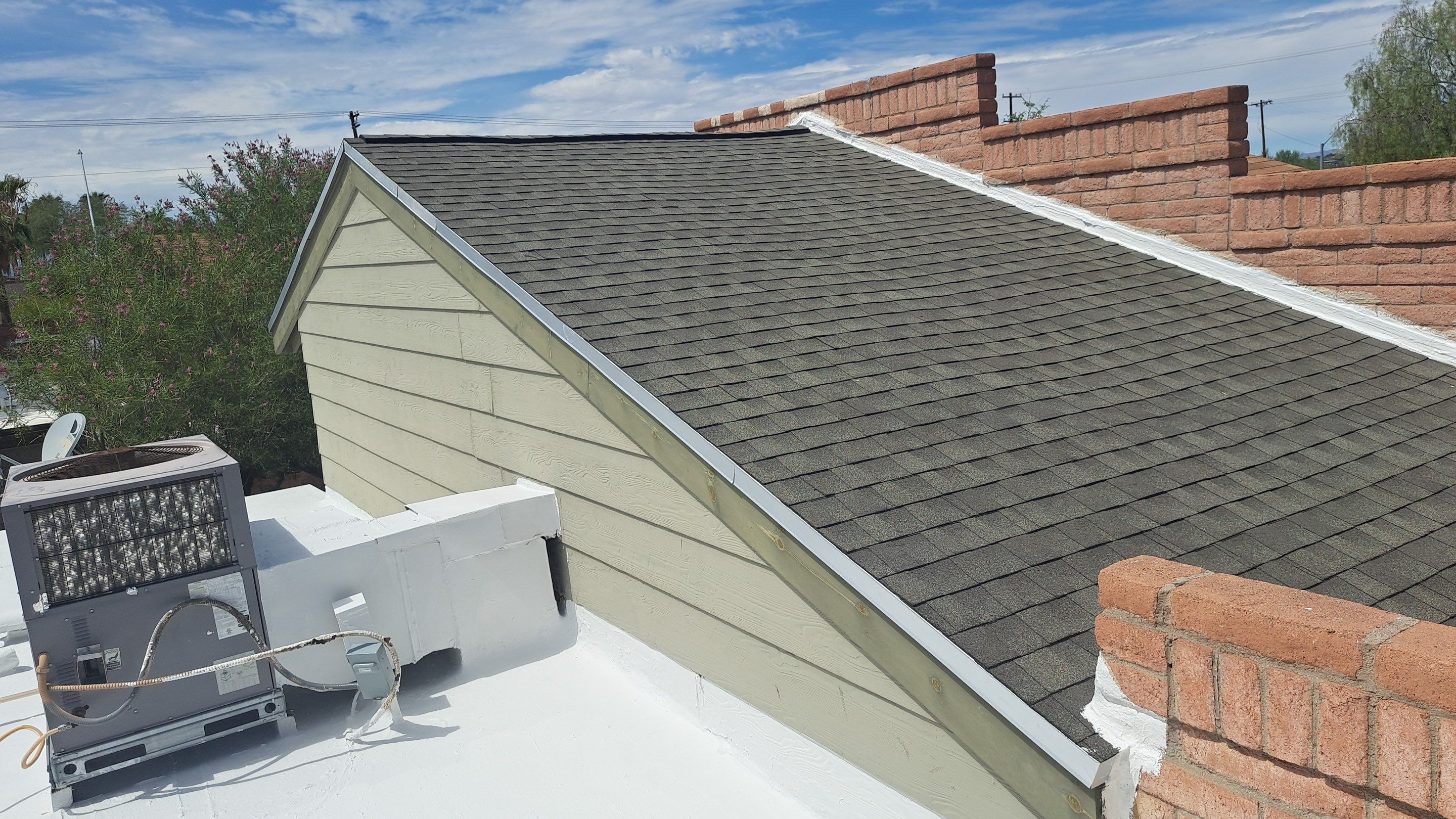 Shingle Roof Replacement and Low Slope Coating in Tucson by West Coast Roofing AZ