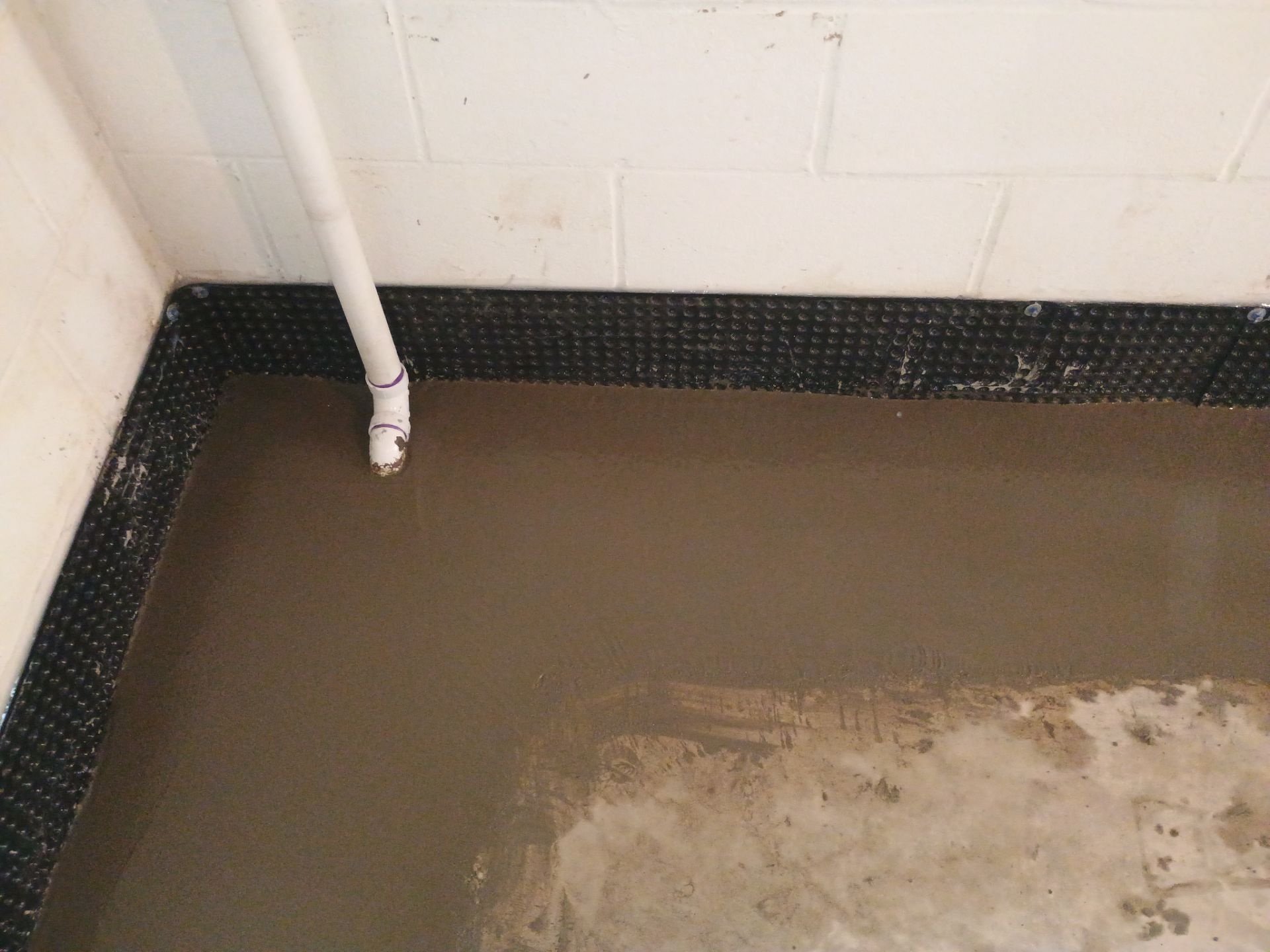 Tying Into an Existing Drain Tile System for Alec by Waterproofing Northeast