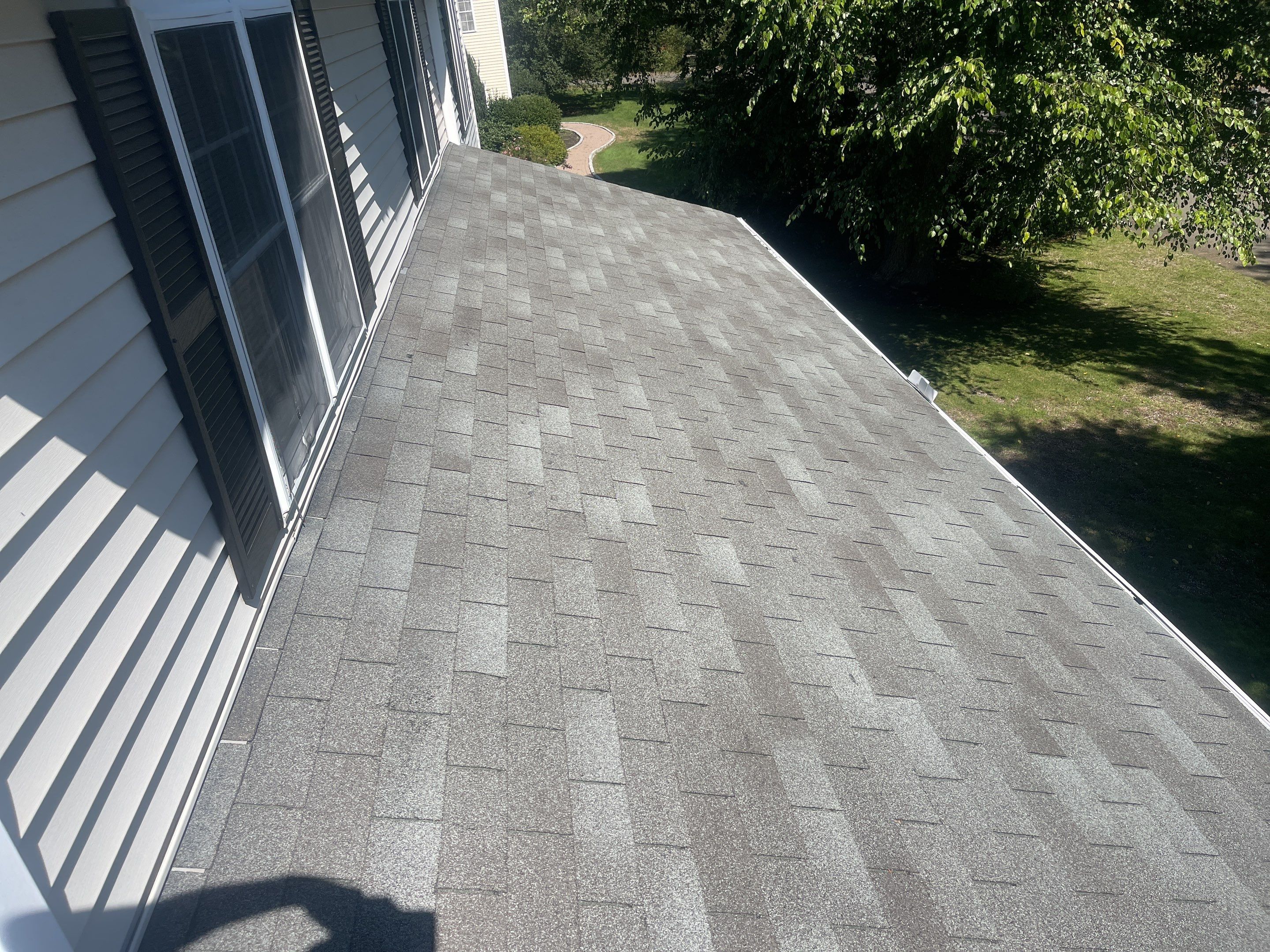 Residential Roofing Installation using Certainteed Landmark Moire Black by A Plus Exterior