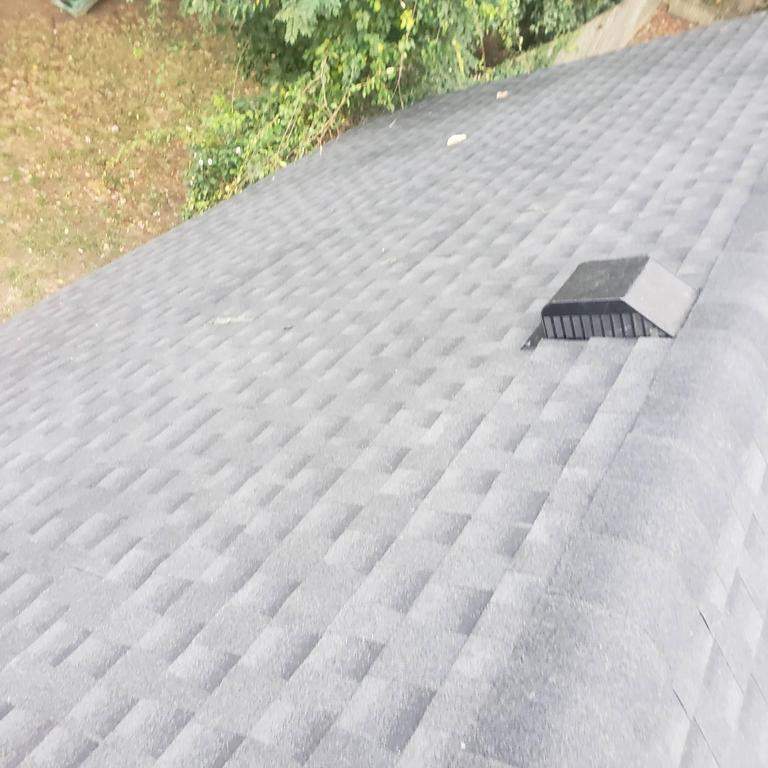 New Roof & Gutters by Island Roofing Inc.