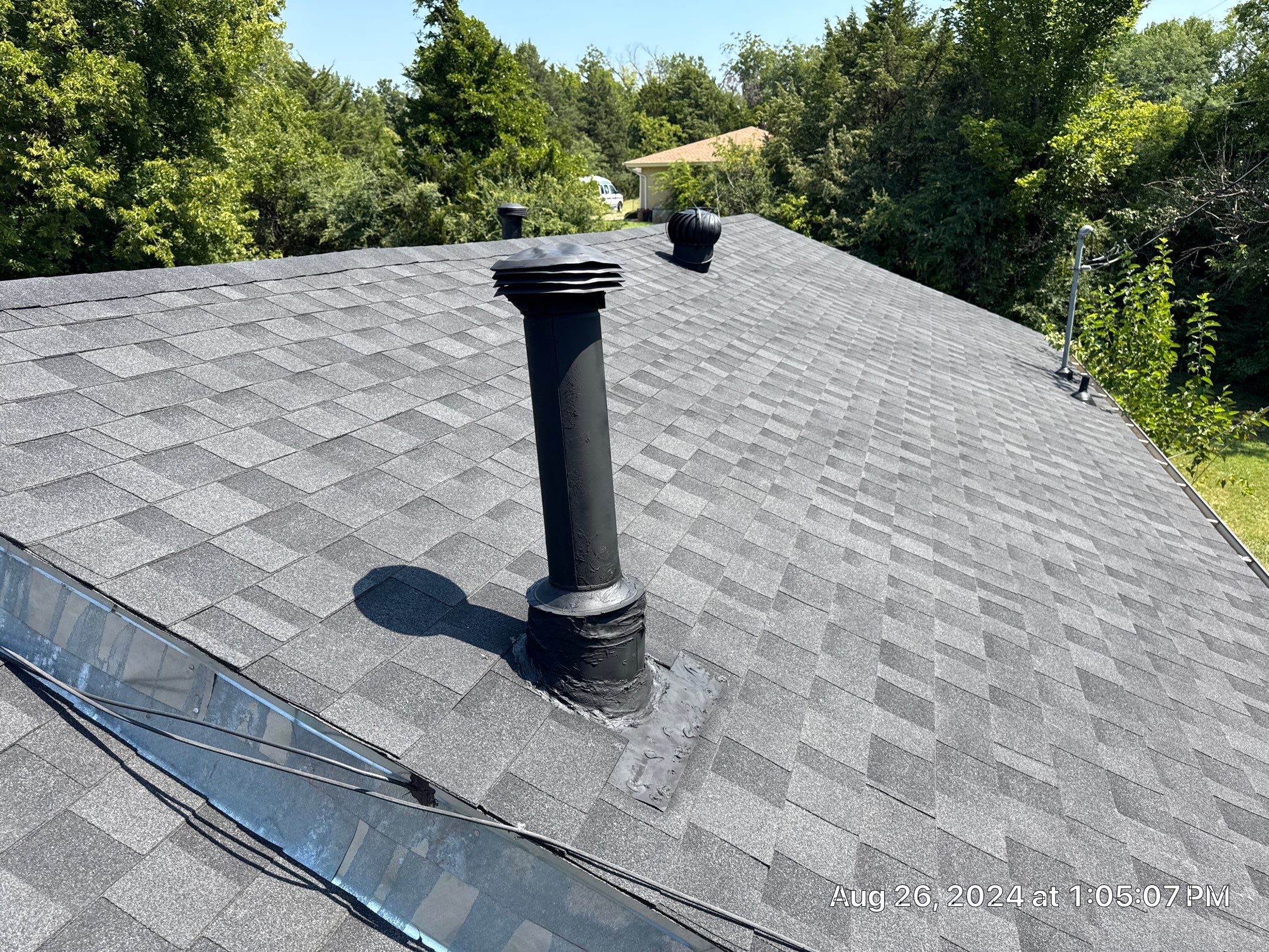 Reroof using IKO Granite Black by Castillo Roofing