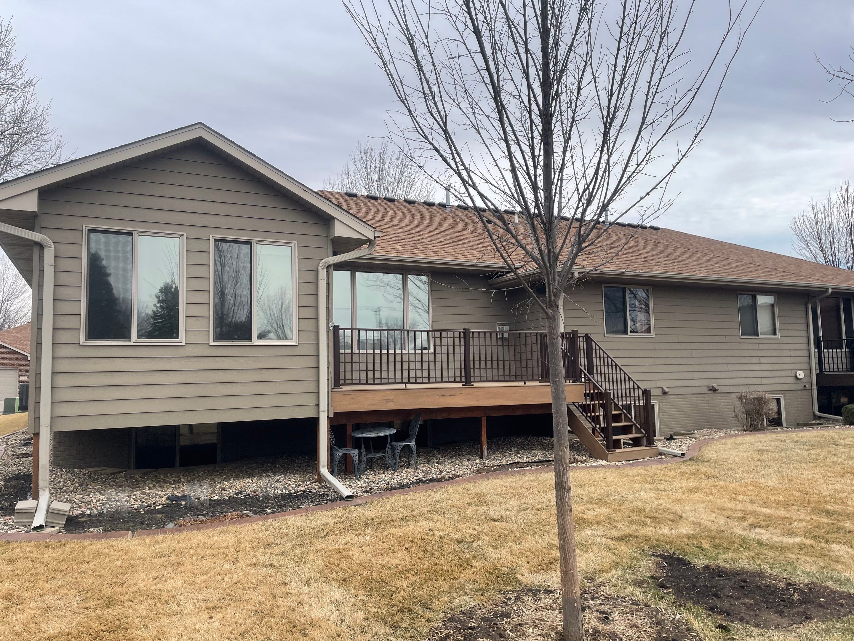 Residential Exterior Siding and Trim Painting in Sioux Falls by Select Painting, Coatings & Garage Cabinets