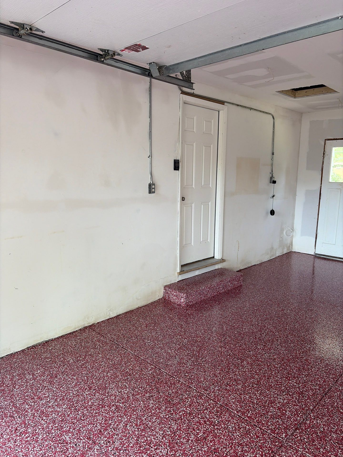 Bayside Garage Interior Remodel with Custom Epoxy Floor Coating by OCS Contracting Services