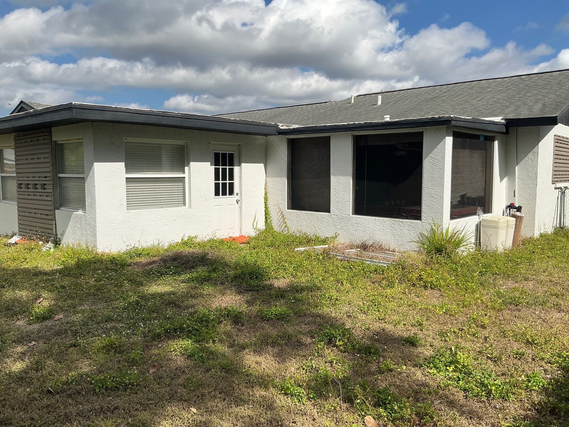 New Downspouts and Splash Guards in Sarasota FL by Gutter Professors