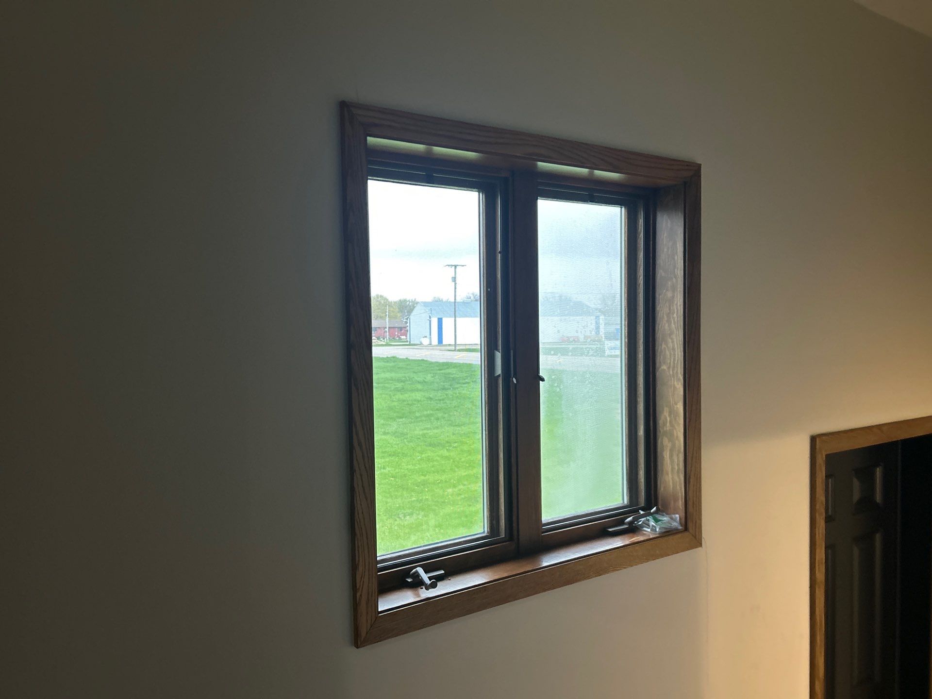 Window replacement using Pella Lifestyle wood/Aluminum window by United Windows and Siding LLC