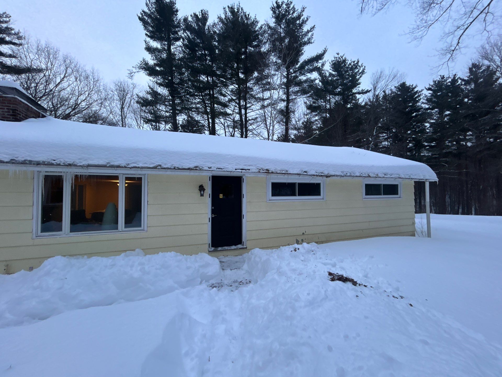 Gutter Installation Project in Stow by Mighty Dog Roofing of Greater Middlesex County