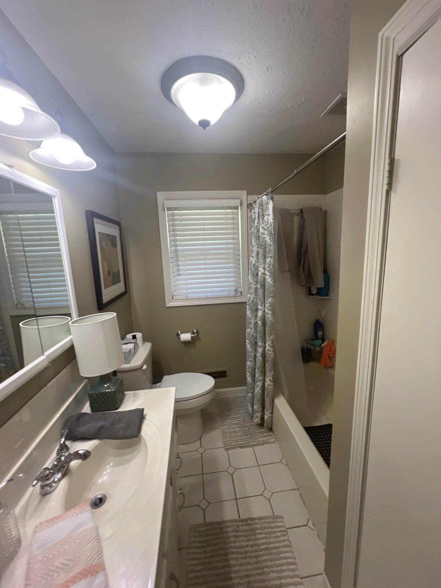 Full bathroom with custom tile by The Shower Company