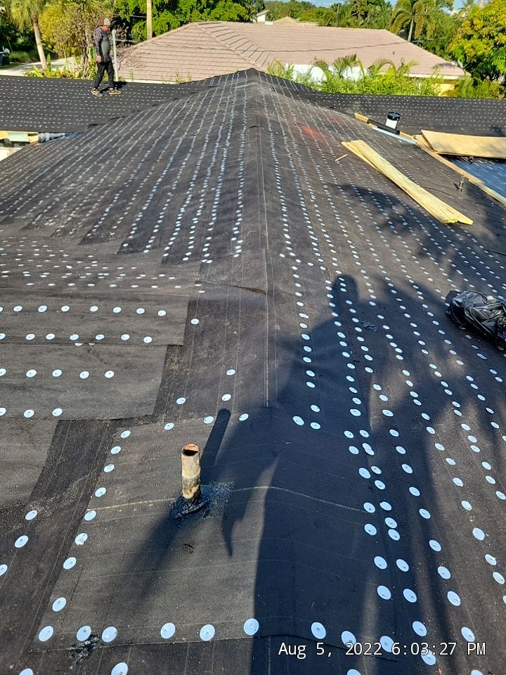 Residential Roofing Installation using 1" Nail strip metal roof by BLUES BROTHERS ROOFING