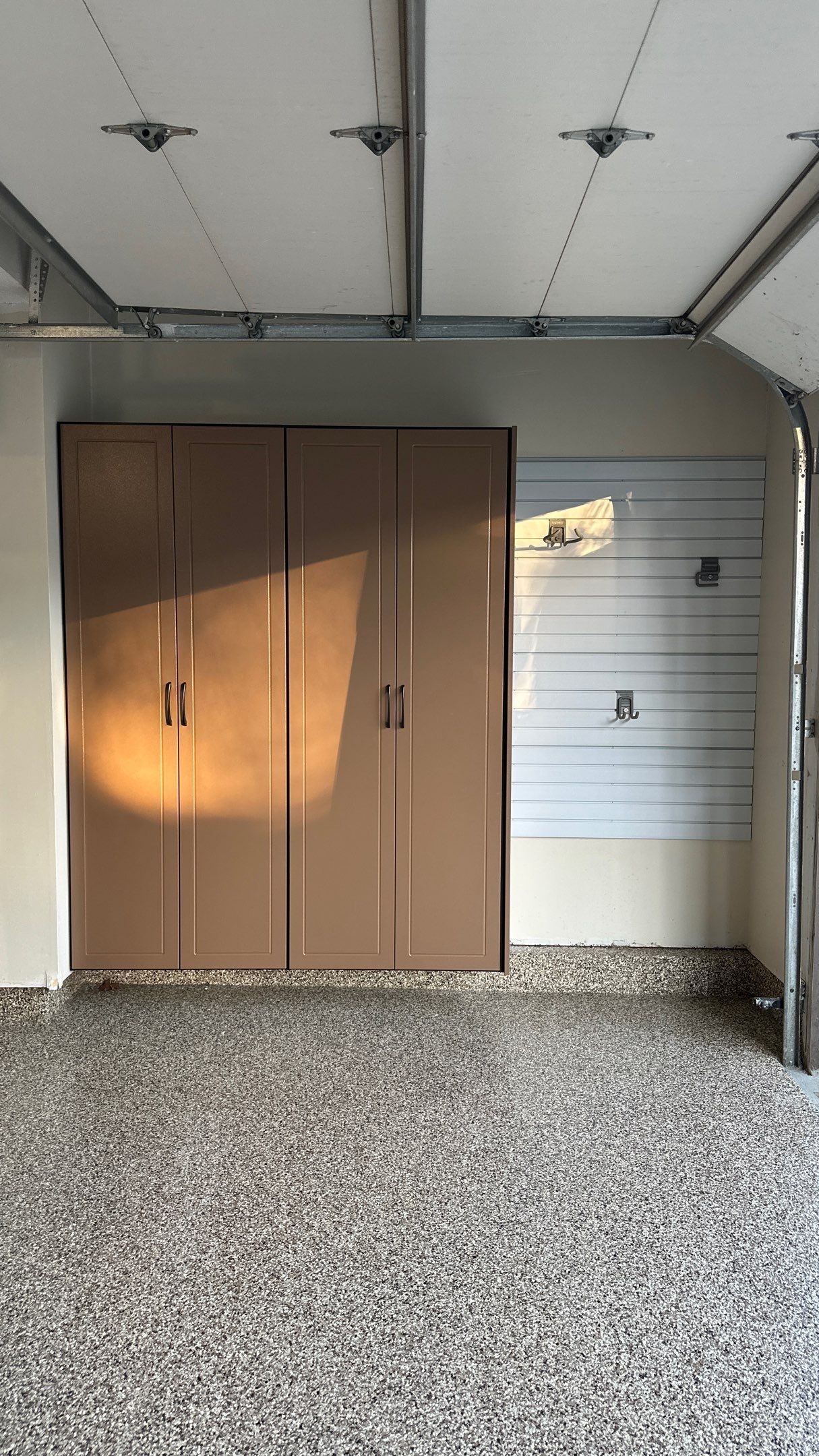Jake P upgraded his garage with brand new cabinets and a new floor  by Banner Garage