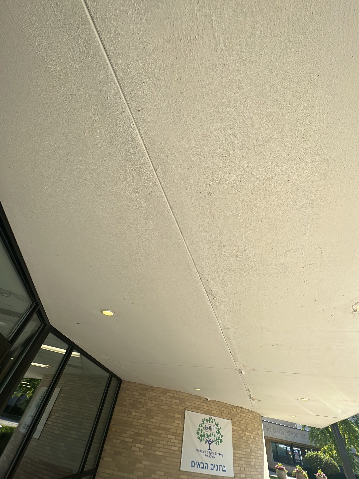 commercial pressure washing using Algaecide, soft wash soap by Northern Power Washing LLC.