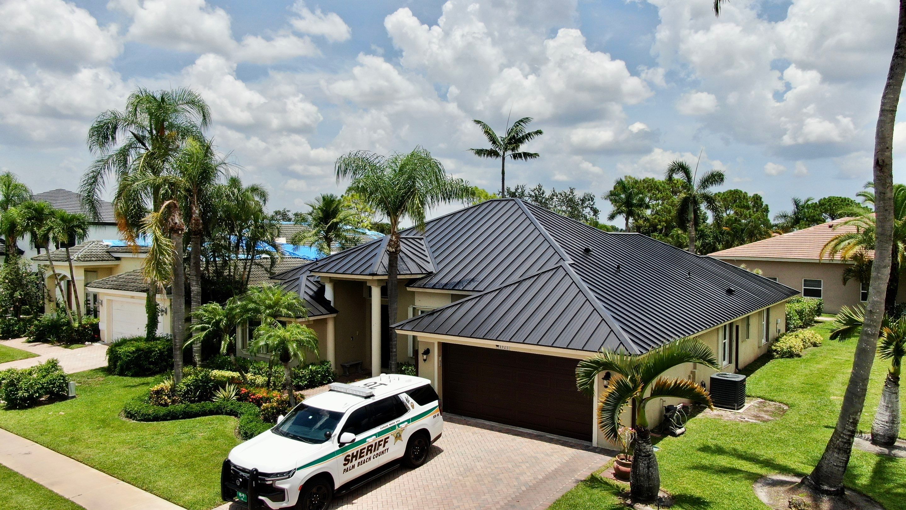 24ga 1.5" Mechanical Seam Matte Black by Total Roofing System The Metal Roof Experts
