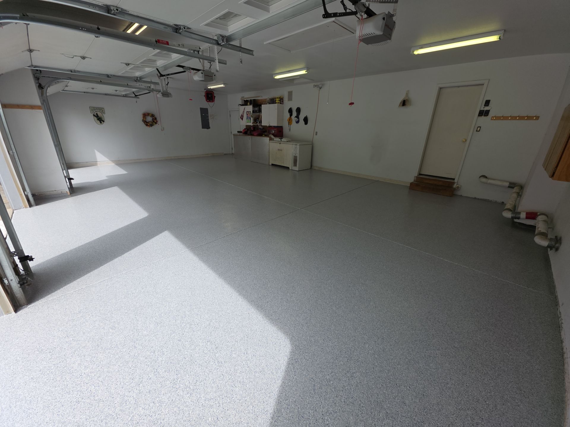 Garage Transformation using 1/8 Tidal Wave by Croc Coatings, LLC