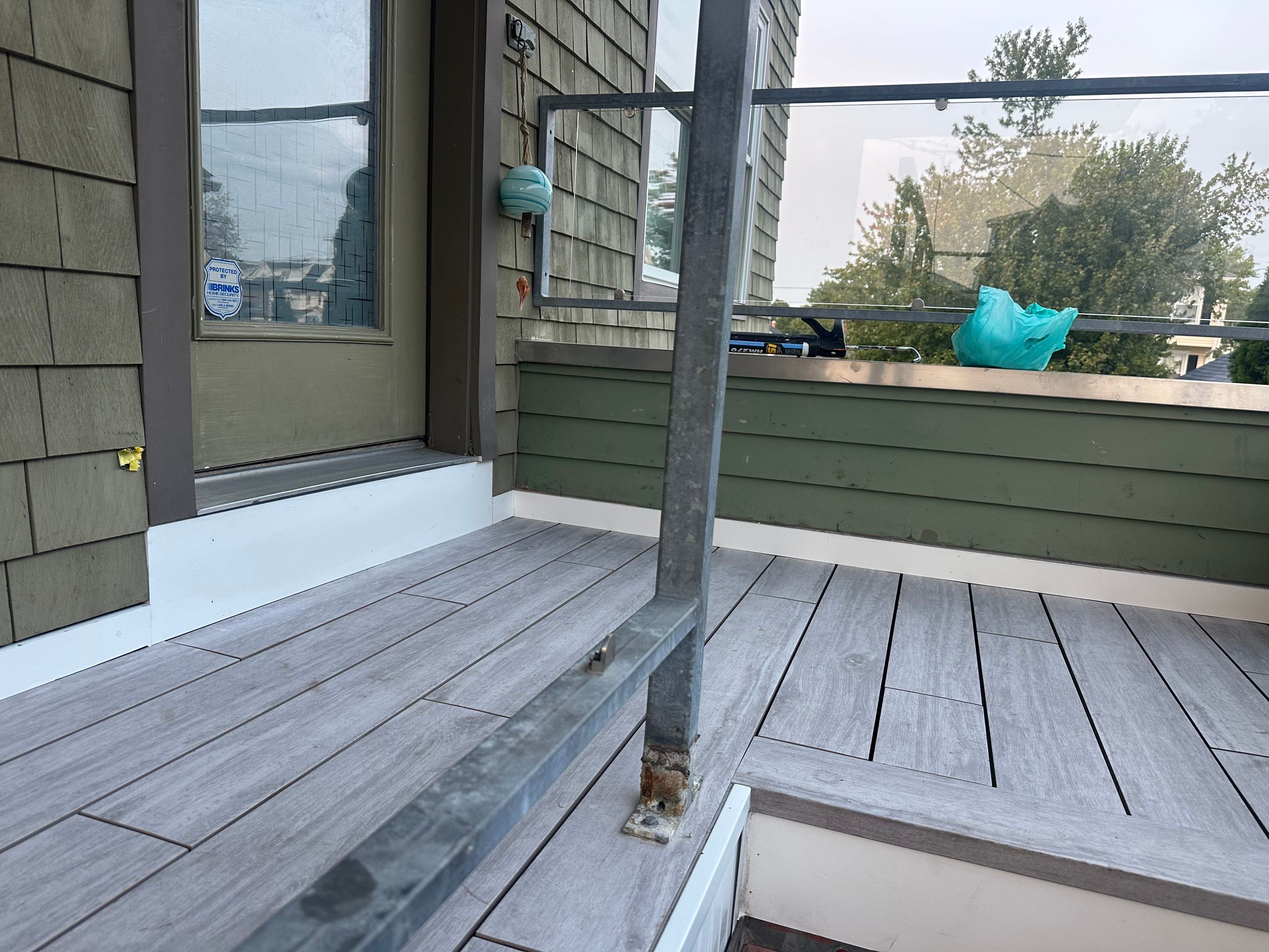 Deck Installation using Tanzite Stone Decking by A Plus Exterior