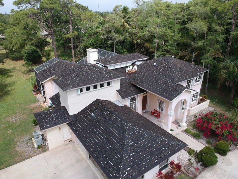 Residential Roofing Installation using 1" Nail strip metal roof by BLUES BROTHERS ROOFING