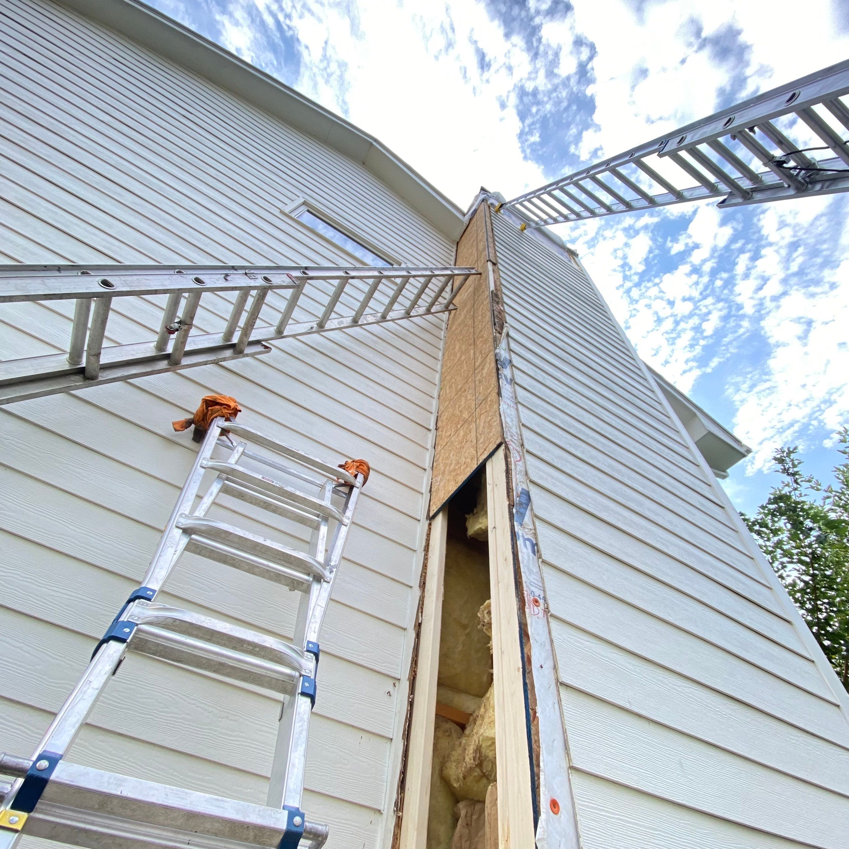 Siding Repair by Crows Roofing LLC