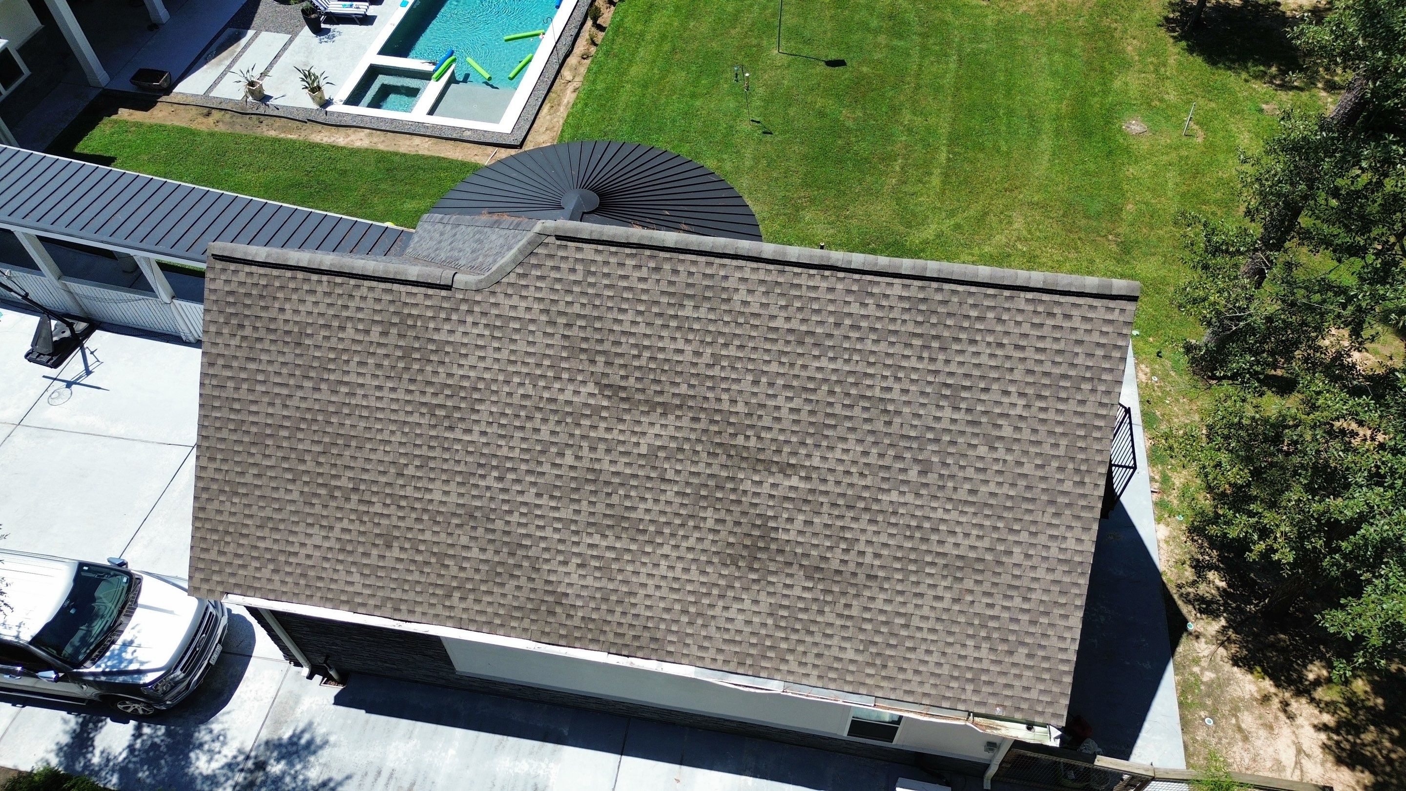 Huffman Roof Repair and Concrete Addition by Modern BYLT Roofing & Construction