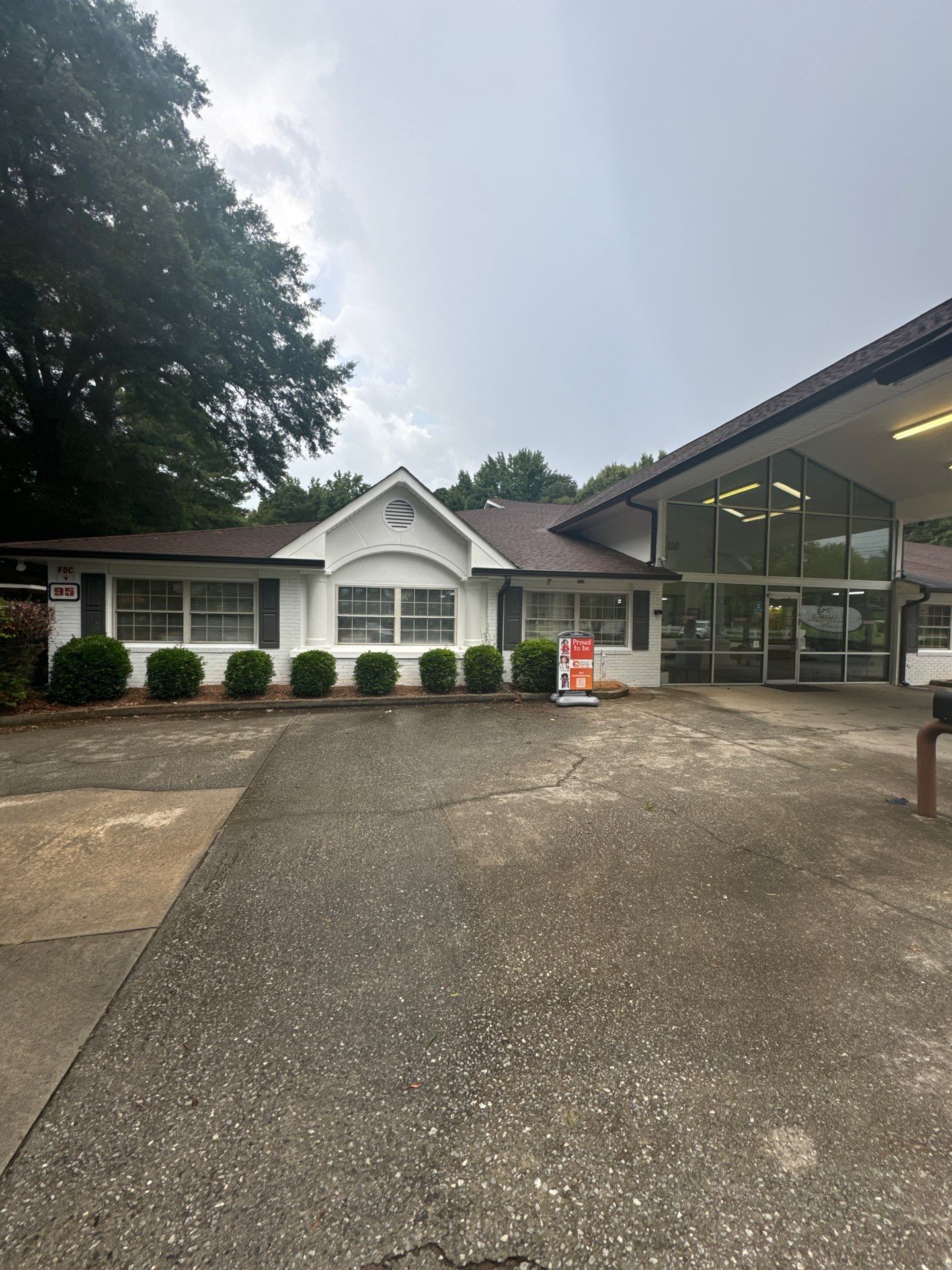 Commercial Exterior Brick and Stucco Painting in Fayetteville by Swift Home Renovations