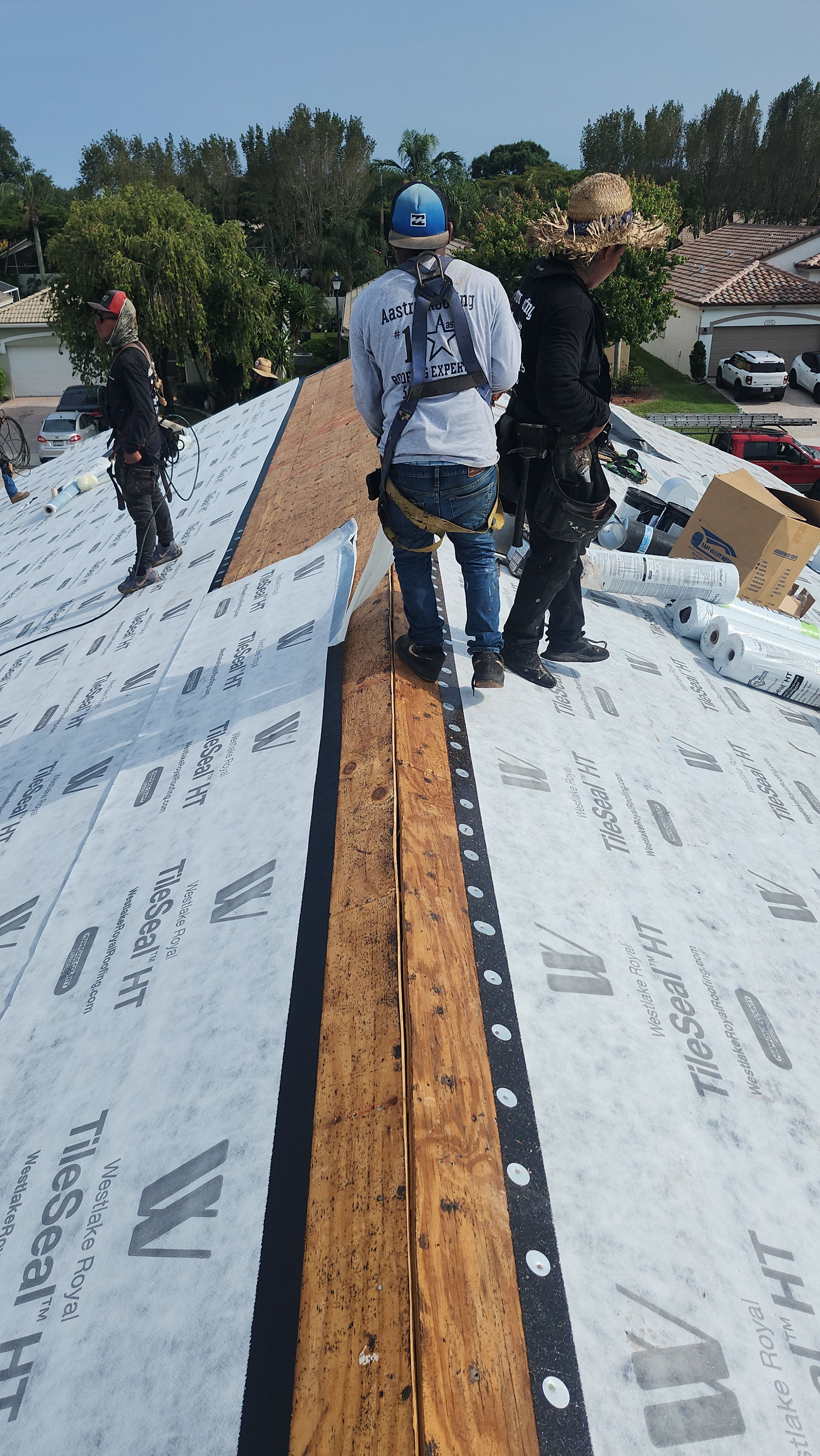 New Barrel Tile Roof Installation and Decking Repair in Boynton Beach by Aastro Roofing