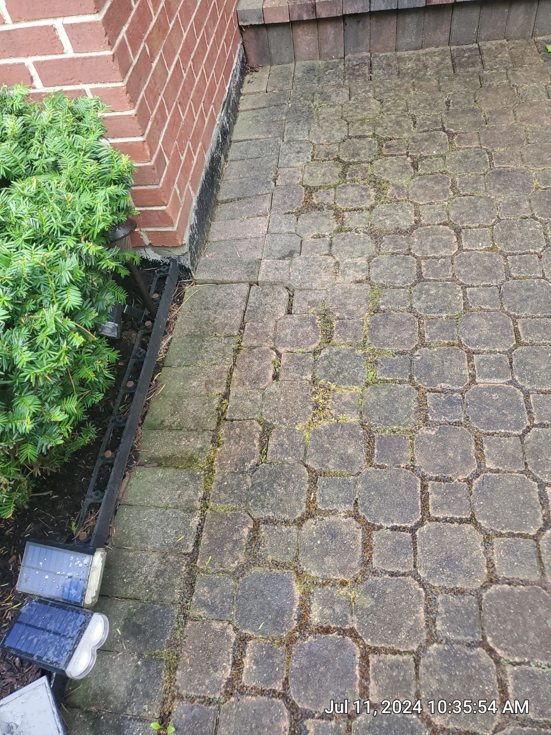 Brick paver repair, clean and seal by Northern Power Washing LLC.