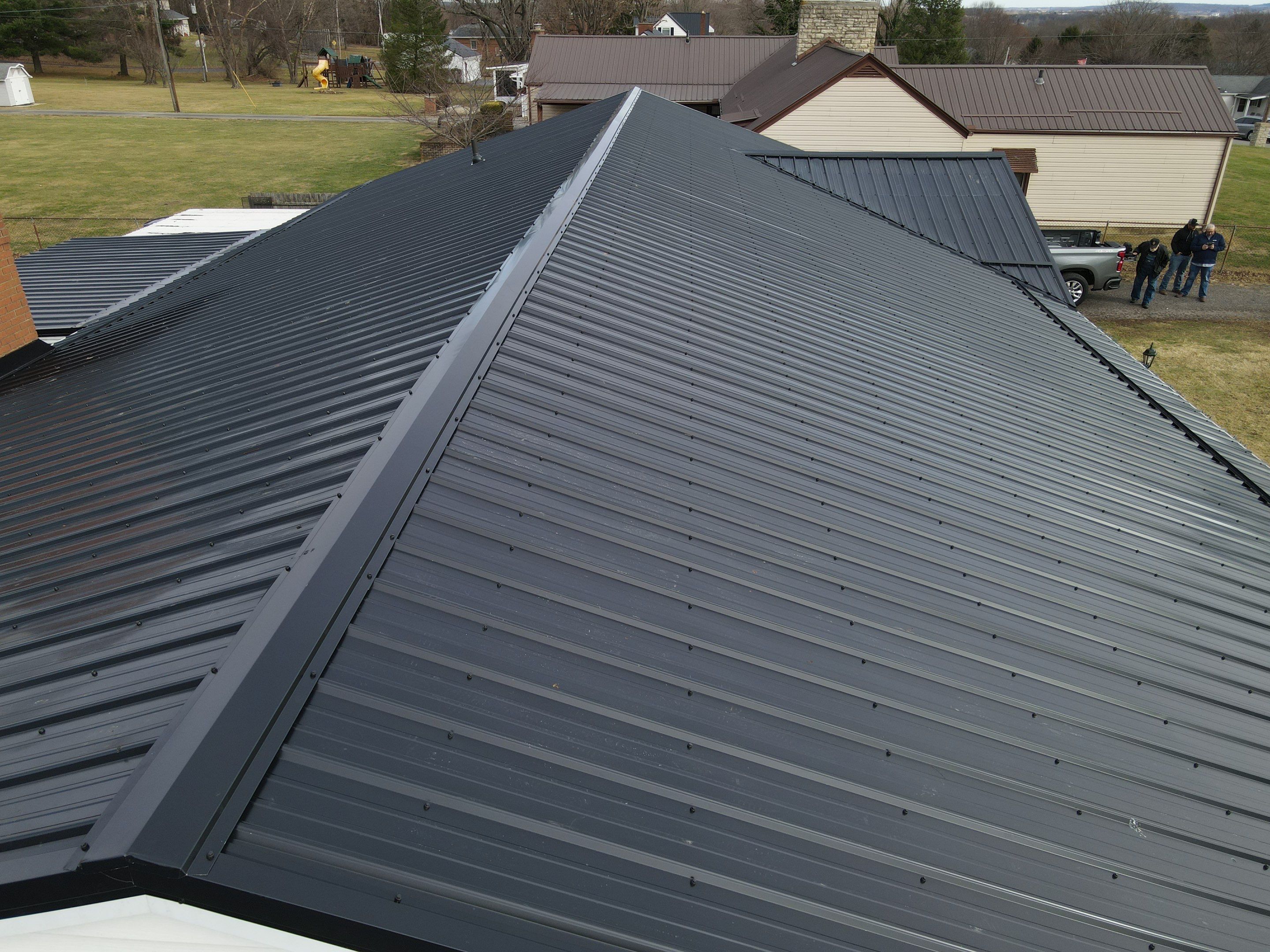 Residential Roofing Installation using Perfromance Panel Metal - Black by RoofX 