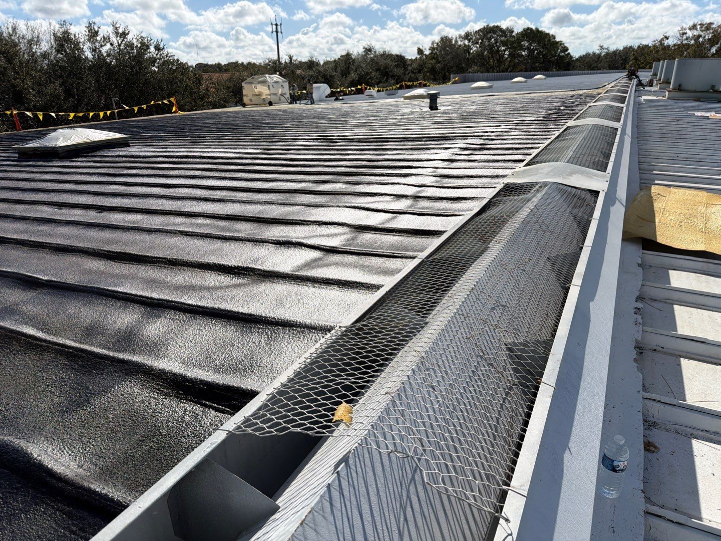 Sarasota Industrial Warehouse Metal Roof Silicone Coating Restoration by CES Roofing