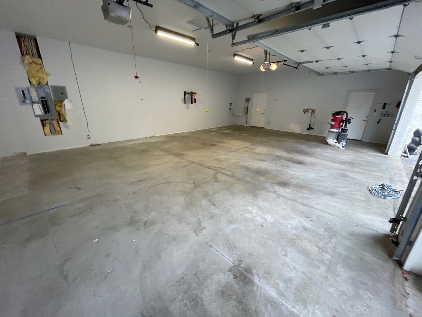 Garage Transformation using Canfield Hybrid & Grey Croc Cabinets by Croc Coatings, LLC