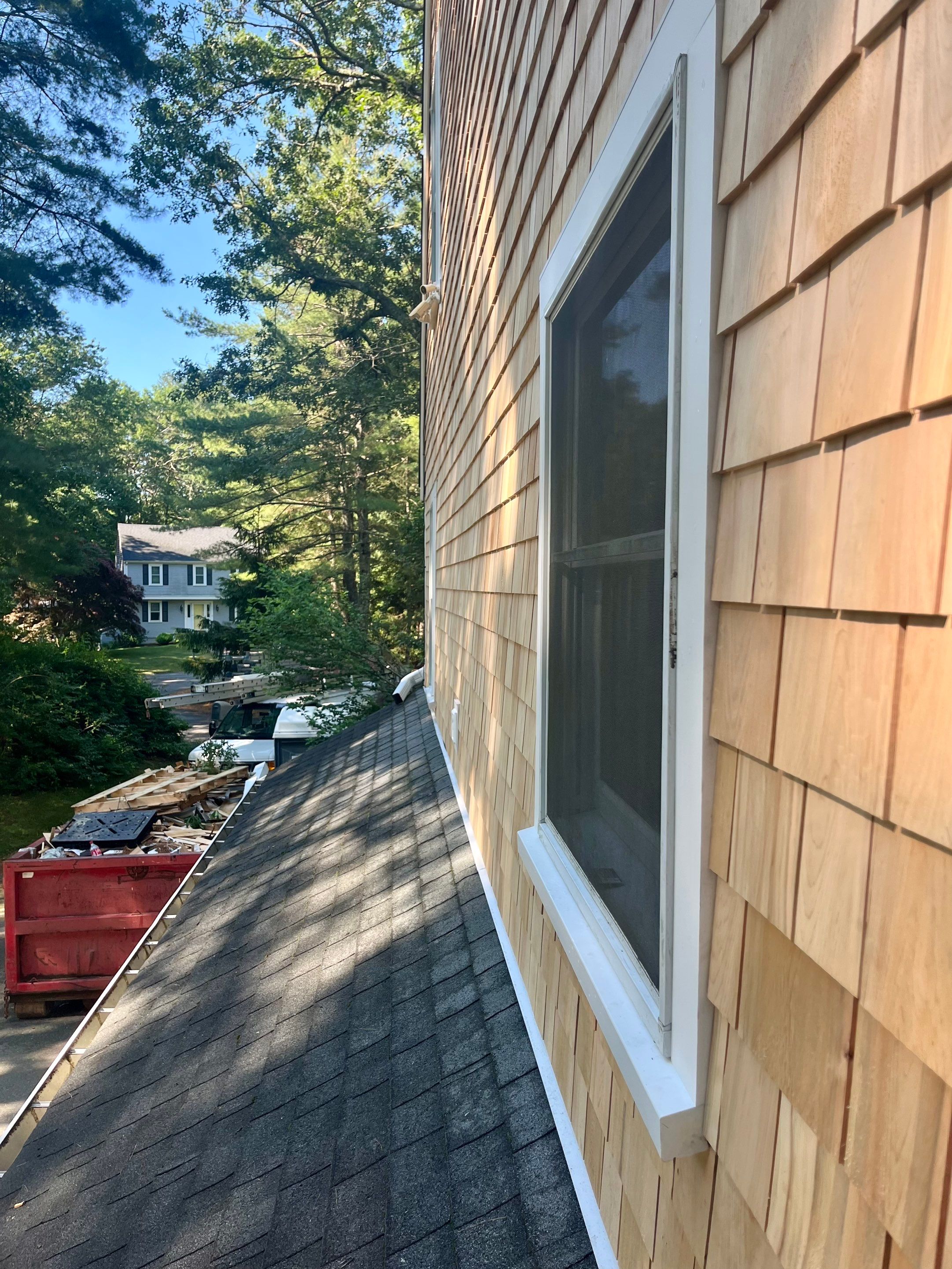 Partial residing project with Red Cedar shingles in Duxbury, MA by UBrothers Construction