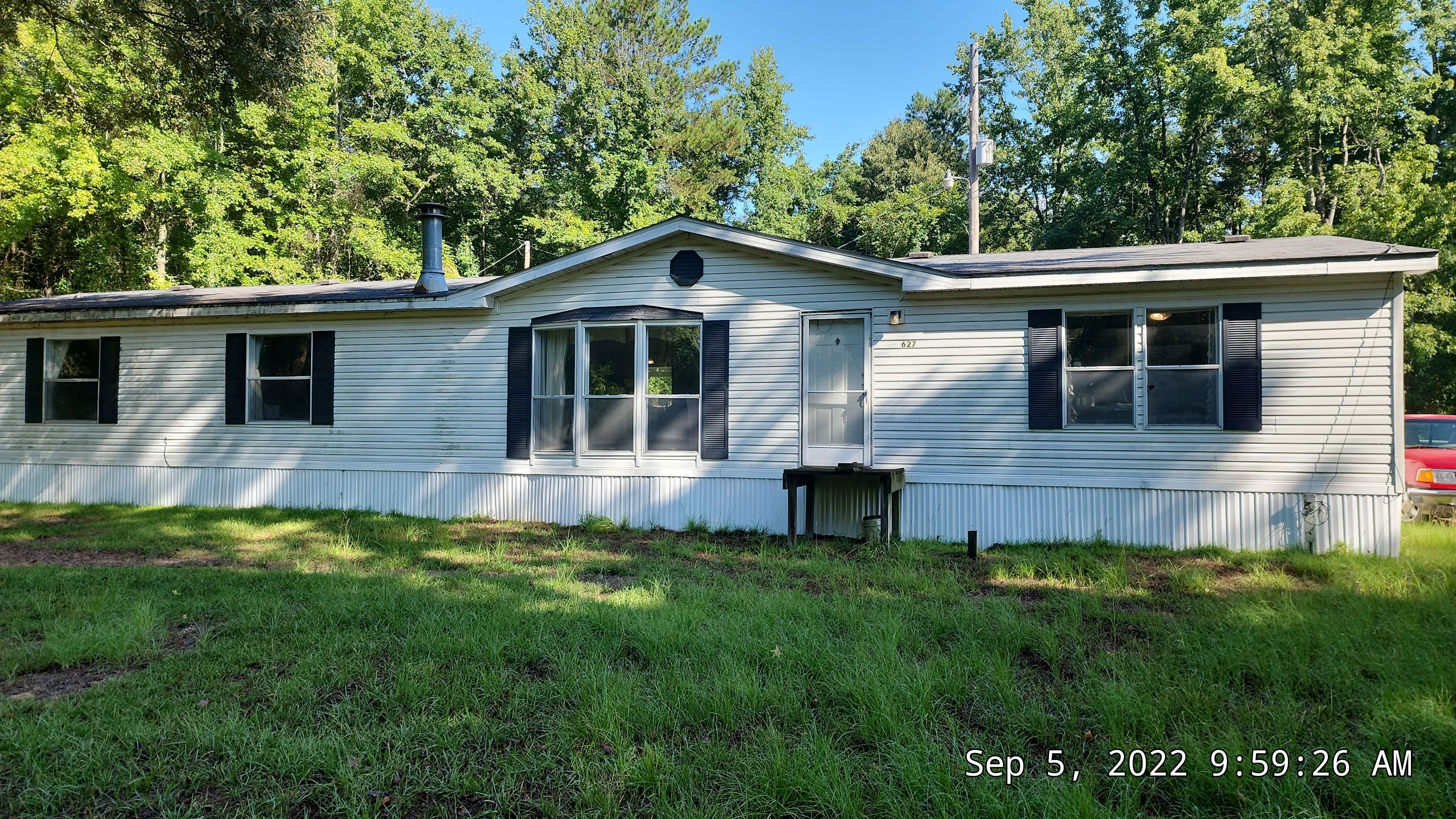 Residential Reroof: 25 Year 3-Tab Shingle by Hostetler Roofing